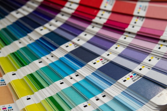 A bunch of different colors of paint on a table