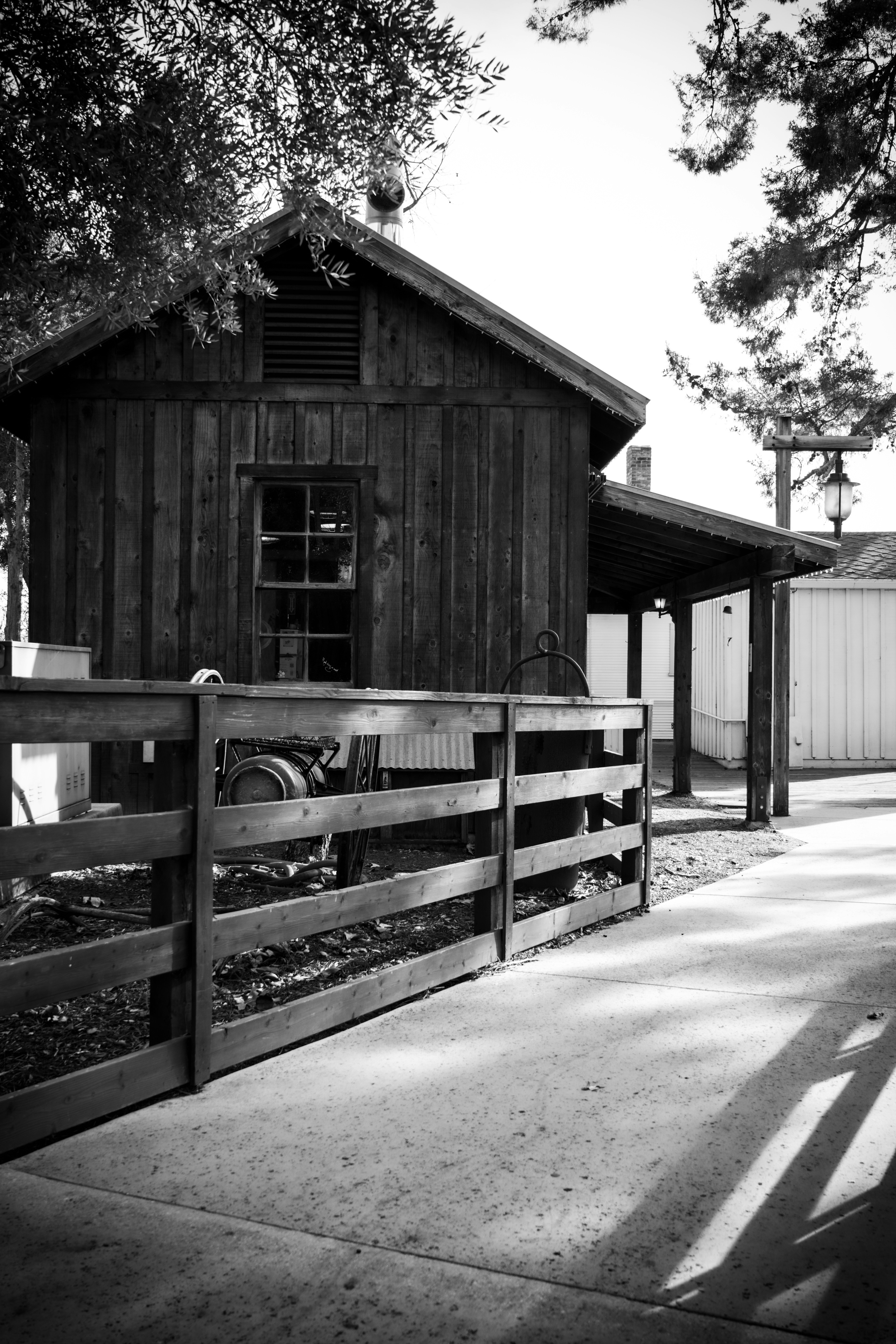 A black and white photo of a barn