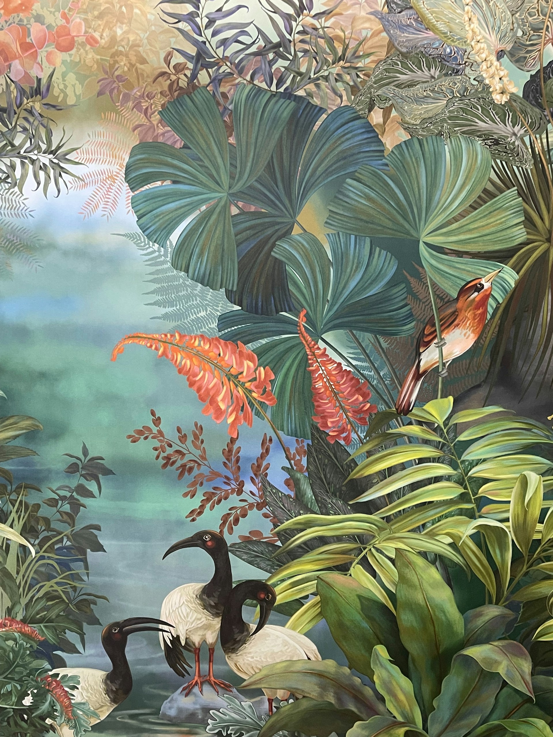 A painting of a tropical scene with birds and plants