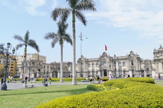 A large building with a lot of trees in front of it