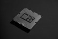 A close up of a processor chip on a table