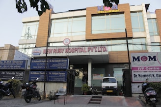 A building with a motorcycle parked in front of it