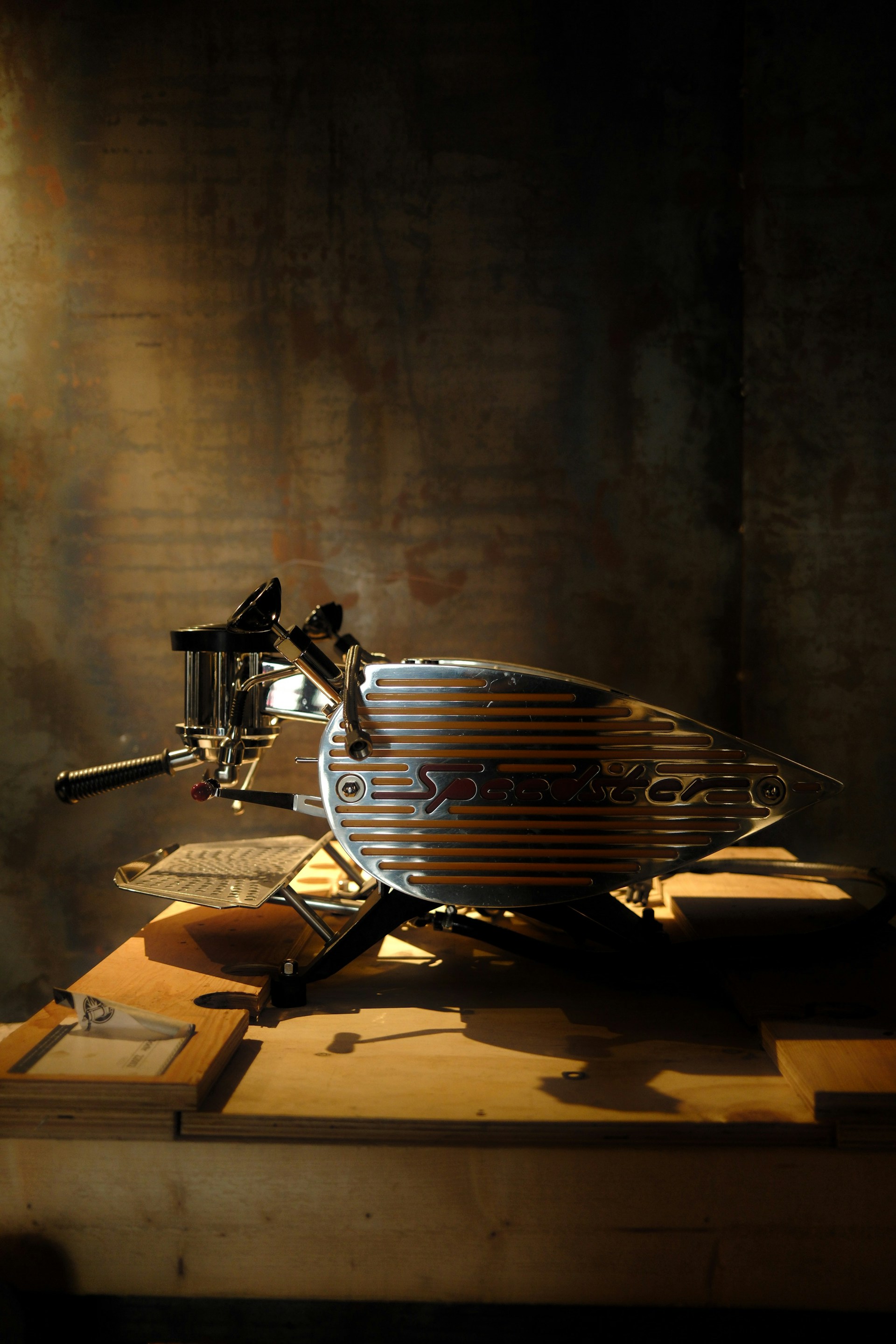 A drum sitting on top of a wooden table