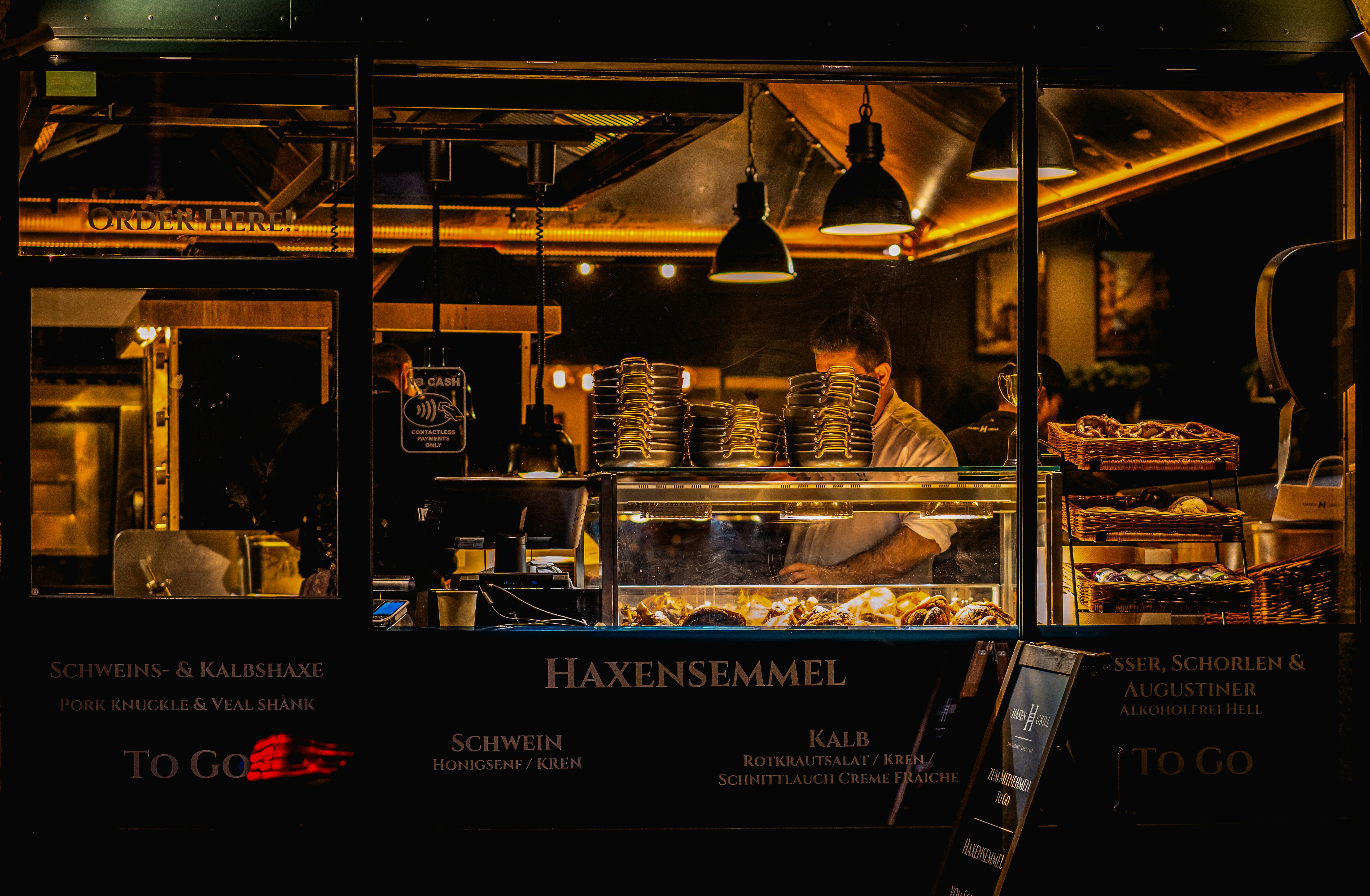 A food stand with a lot of food inside of it