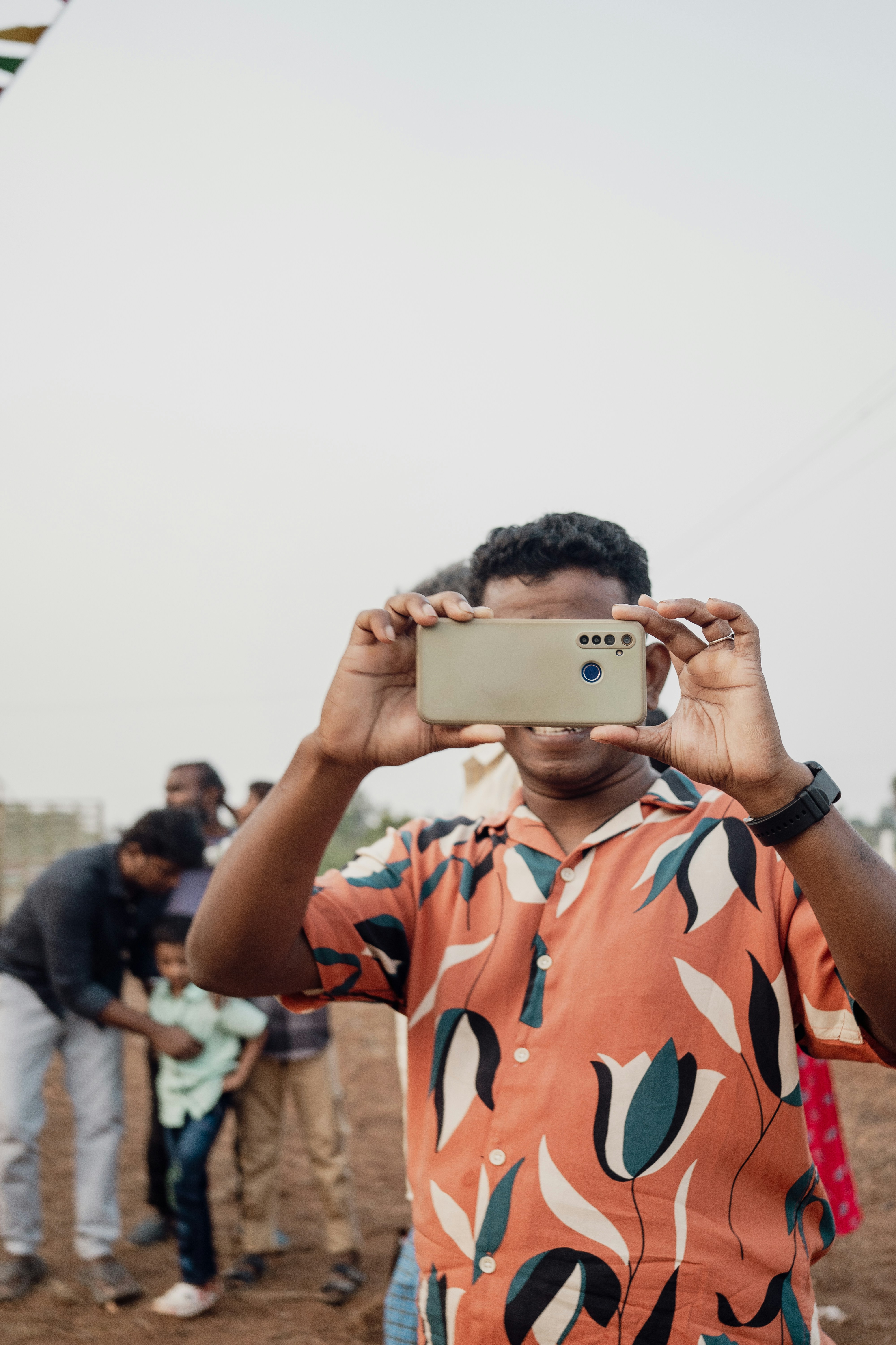 A man taking a picture with his cell phone