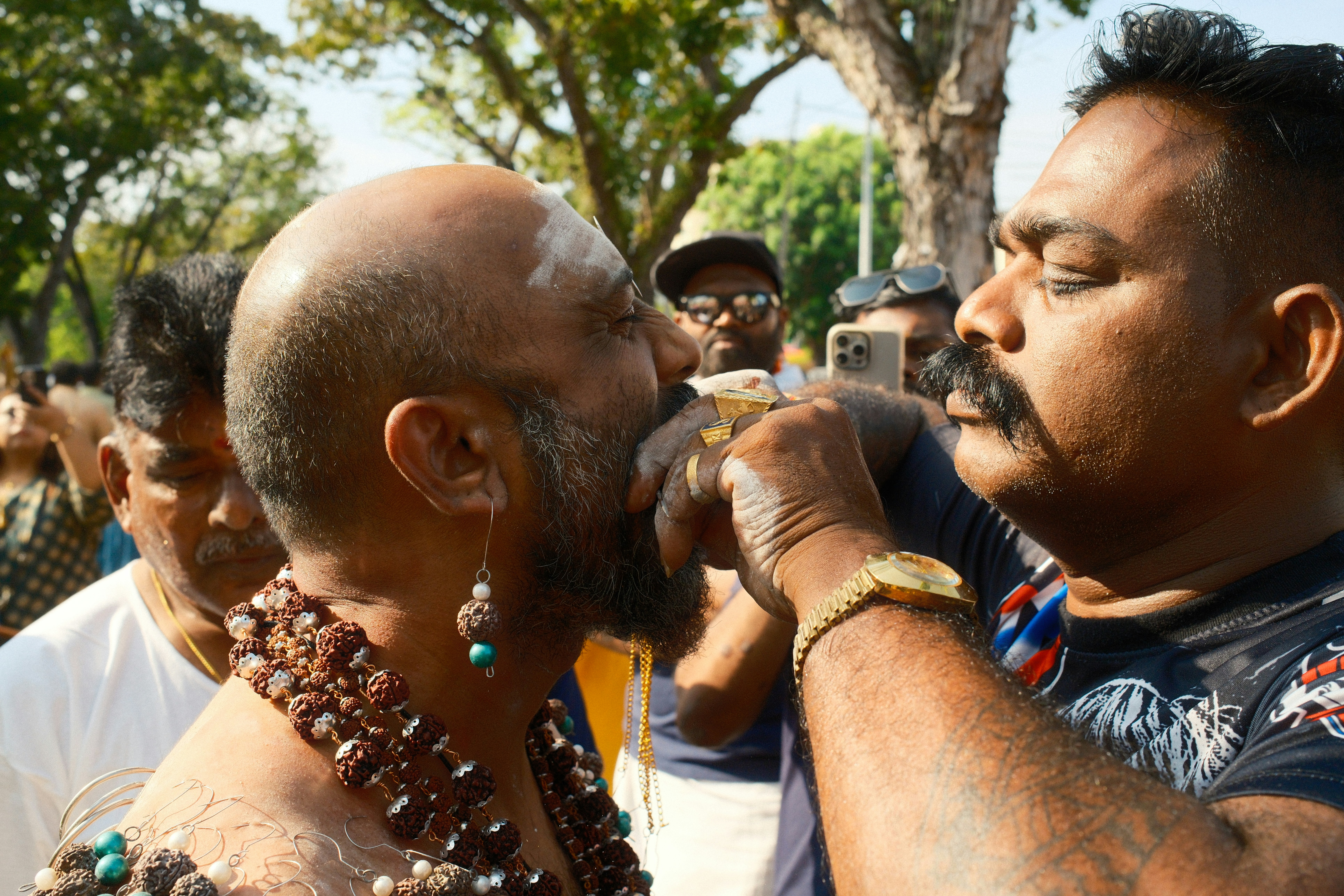 A group of men standing next to each other