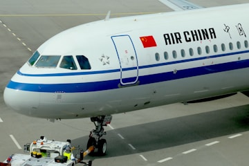 An air china airplane is on the runway