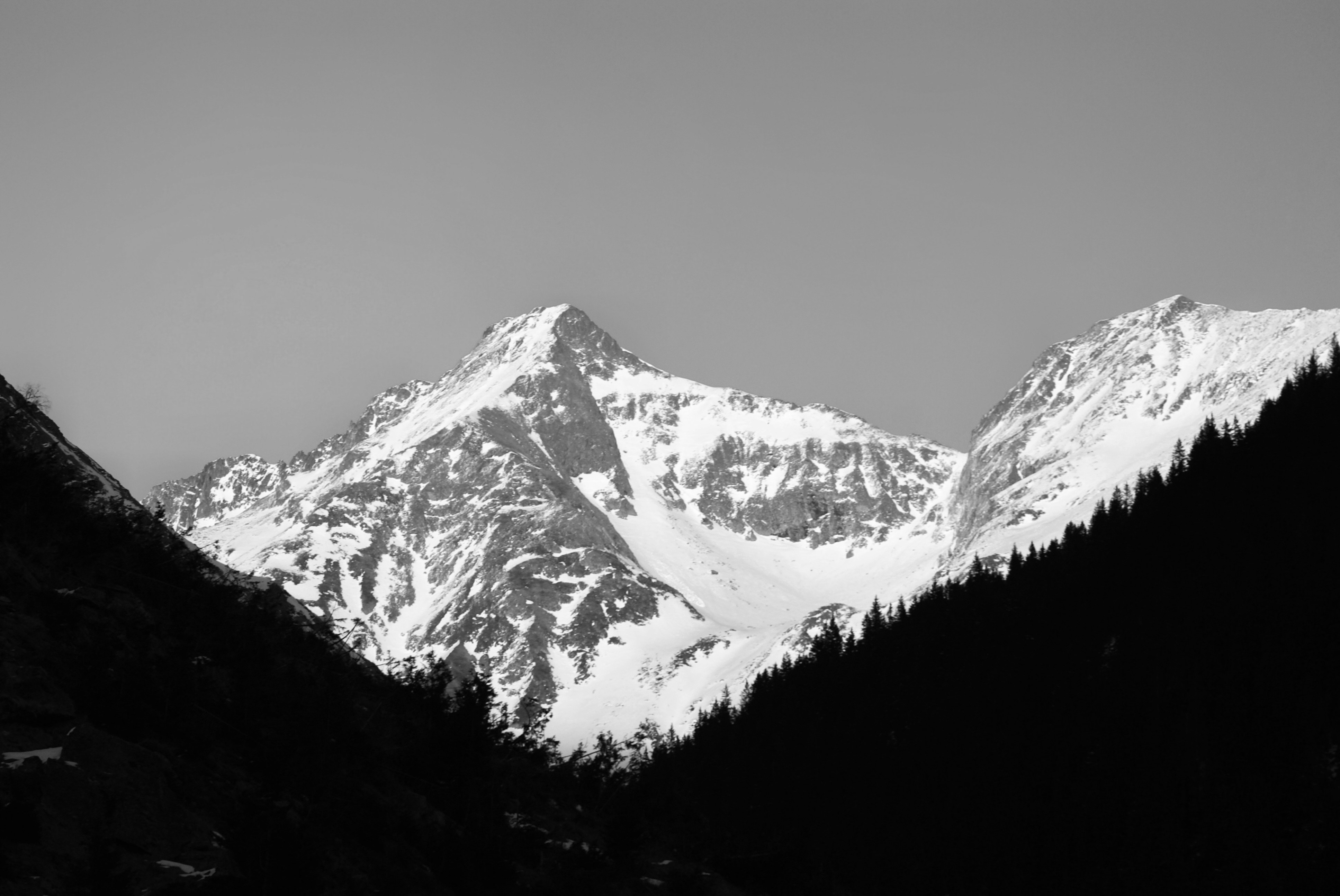 A black and white photo of a mountain range