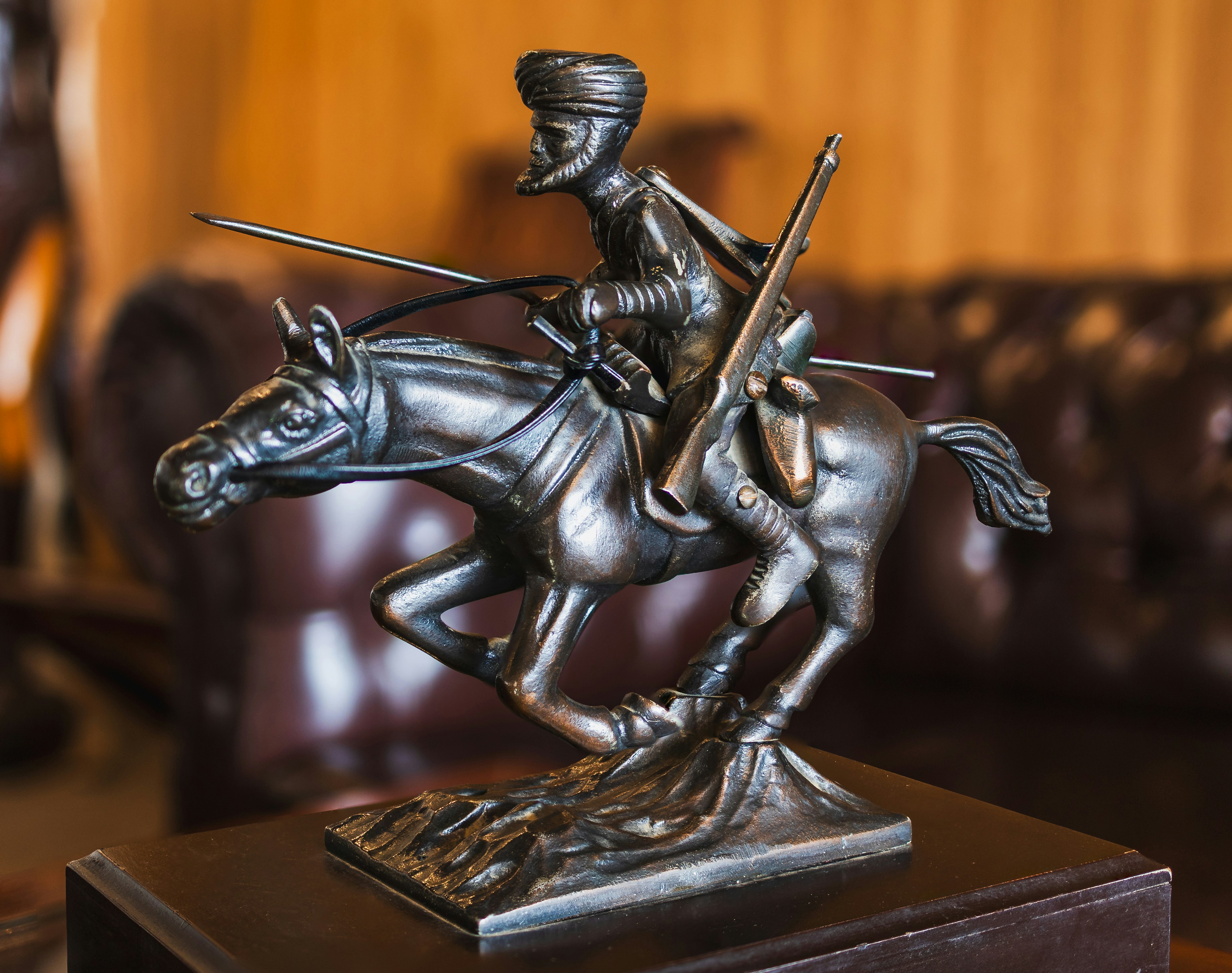 A statue of a man riding a horse