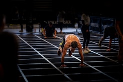 A group of people standing on top of a race track