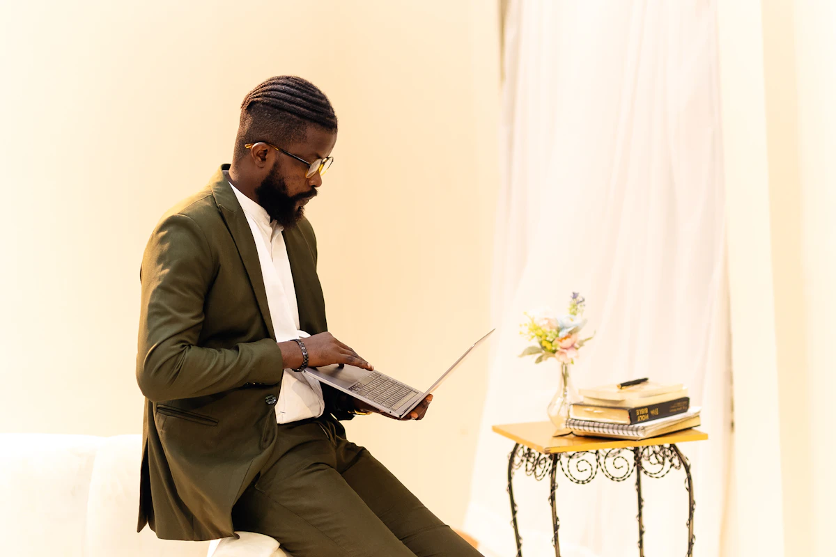 Black executives at a boardroom table reviewing enterprise AI data dashboards