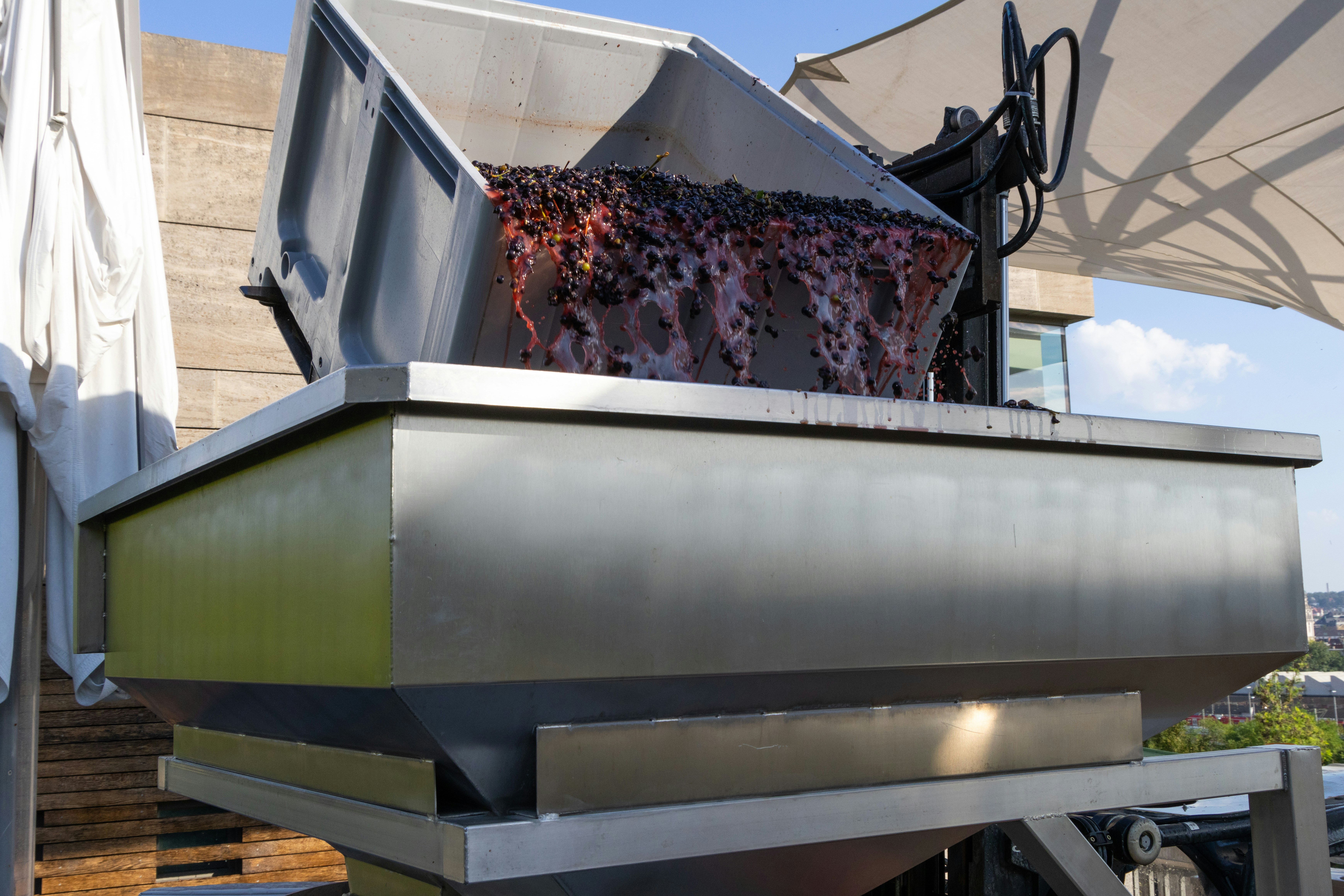 A large metal box sitting on top of a roof