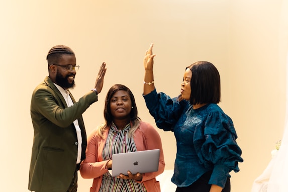 A group of people standing next to each other