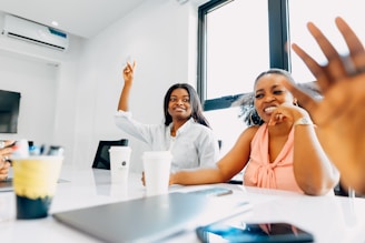 A group of people sitting around a table