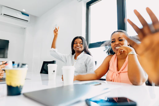 A group of people sitting around a table