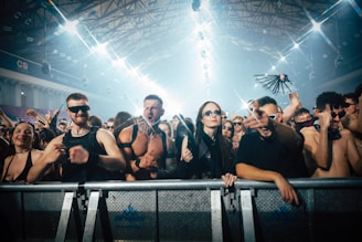 A group of people standing in front of a crowd