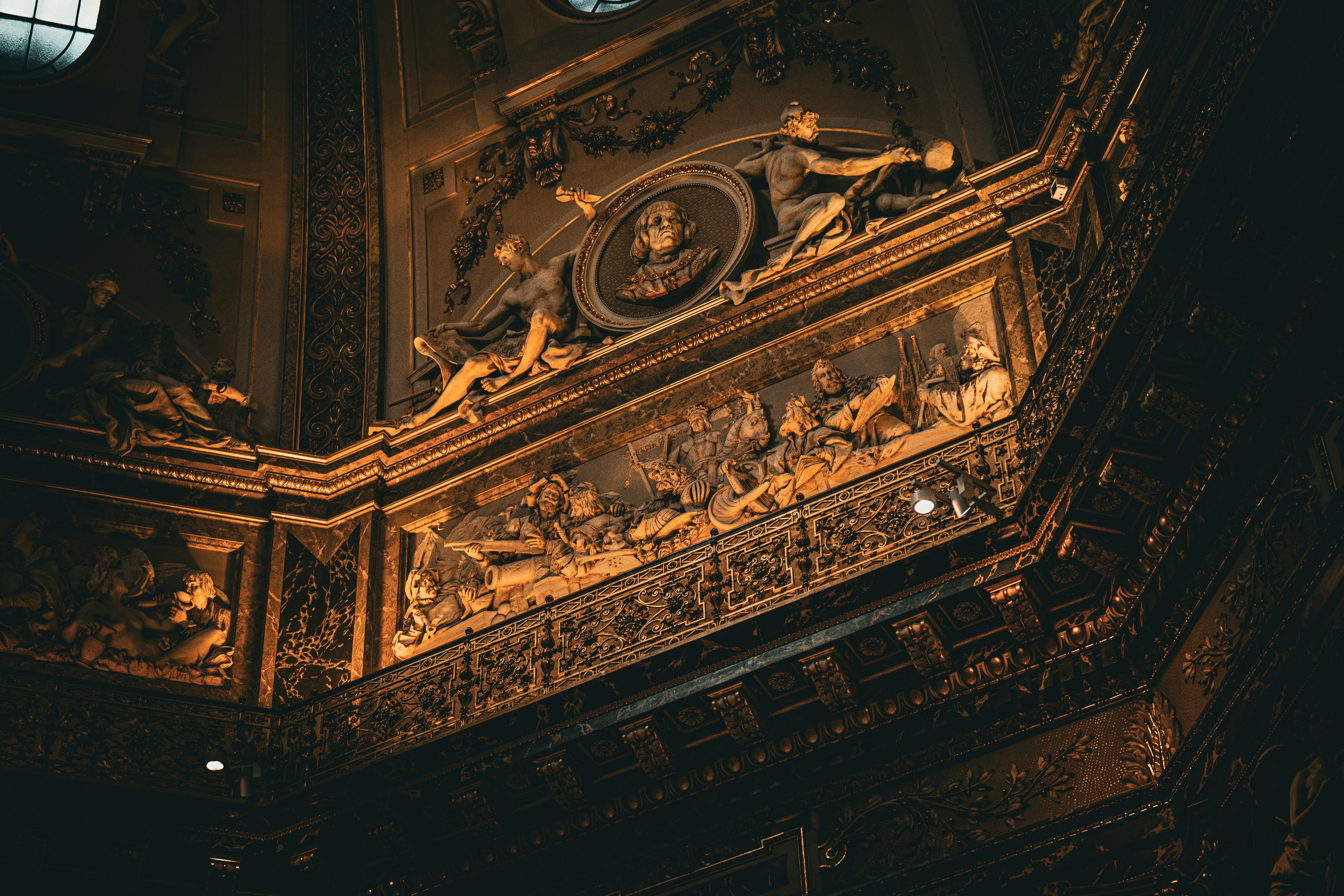 A clock on the side of a building at night