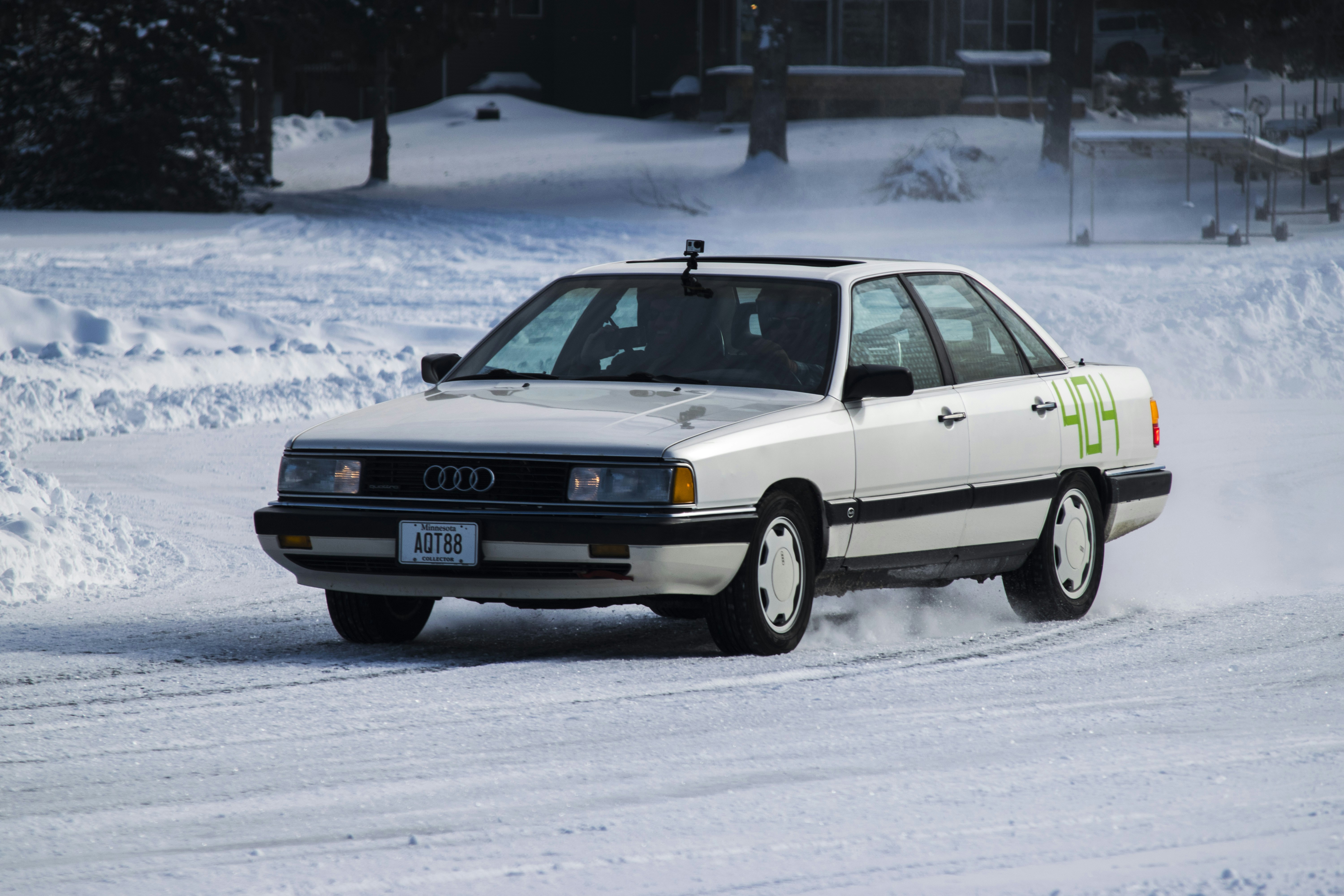 A white car driving down a snow covered road photo – Free Audi Image on ...