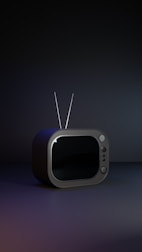 An old TV sitting on top of a table