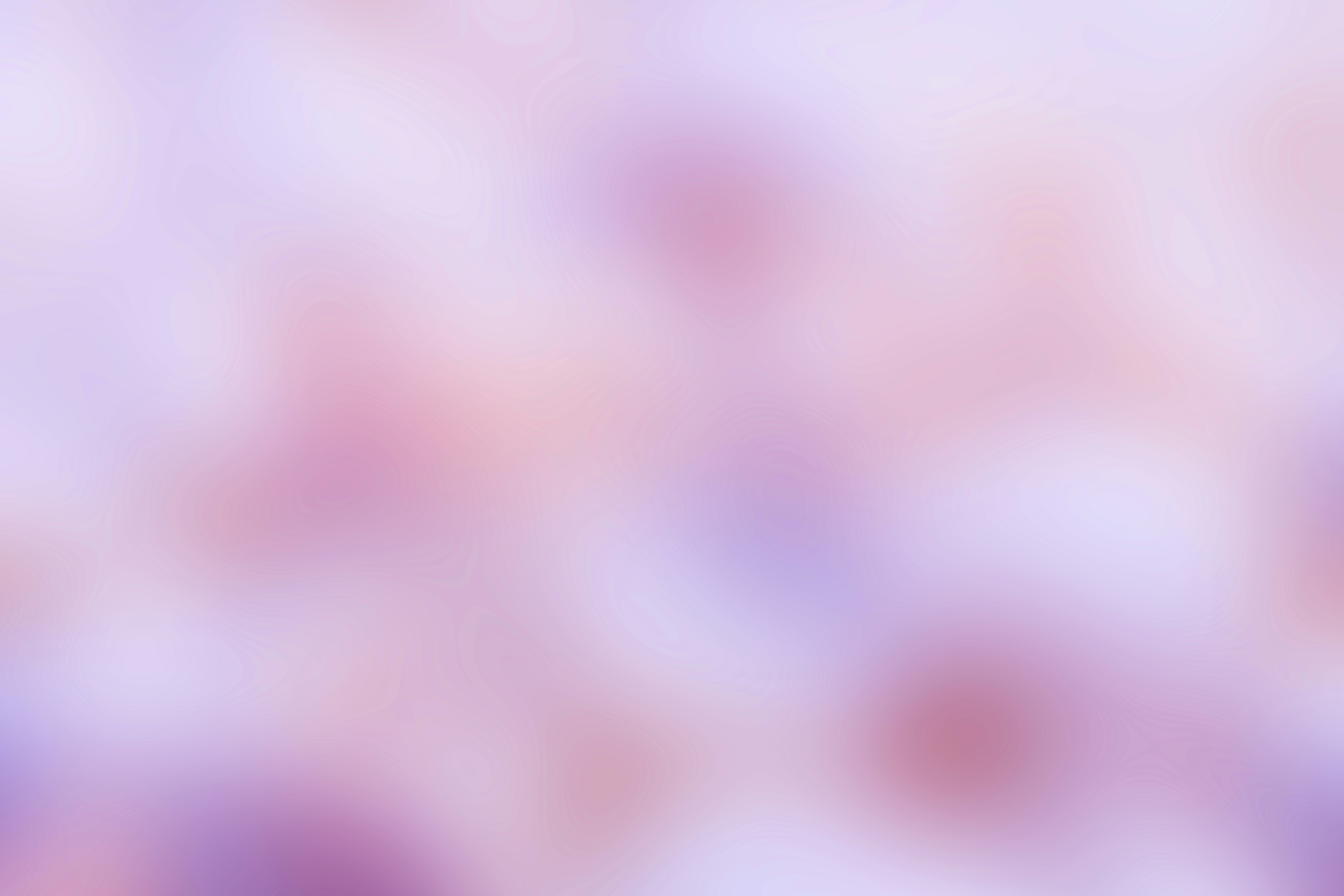 Ein verschwommenes Bild mit einem lila-weißen Hintergrund