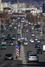 A city street filled with lots of traffic