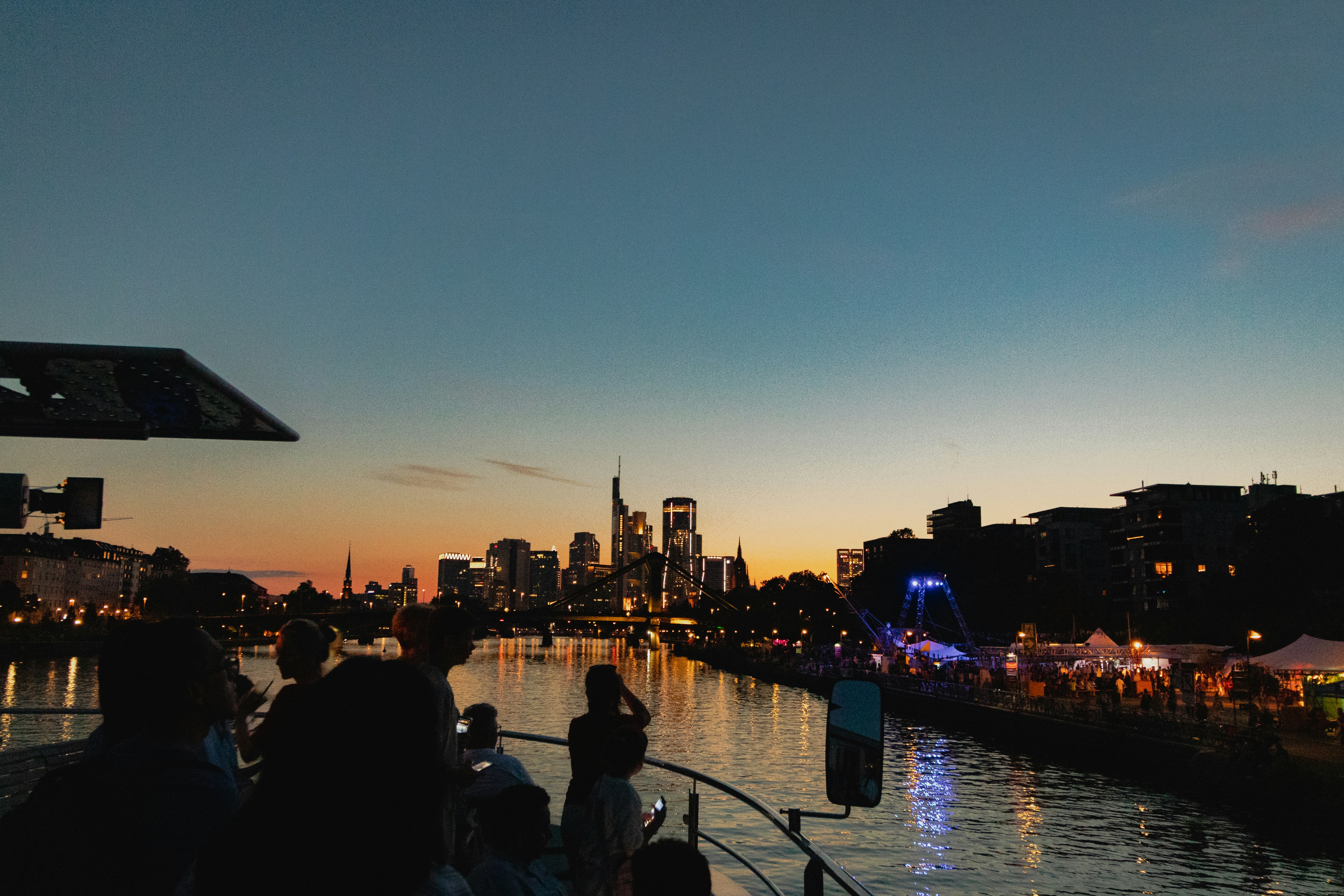 A group of people riding on top of a boat