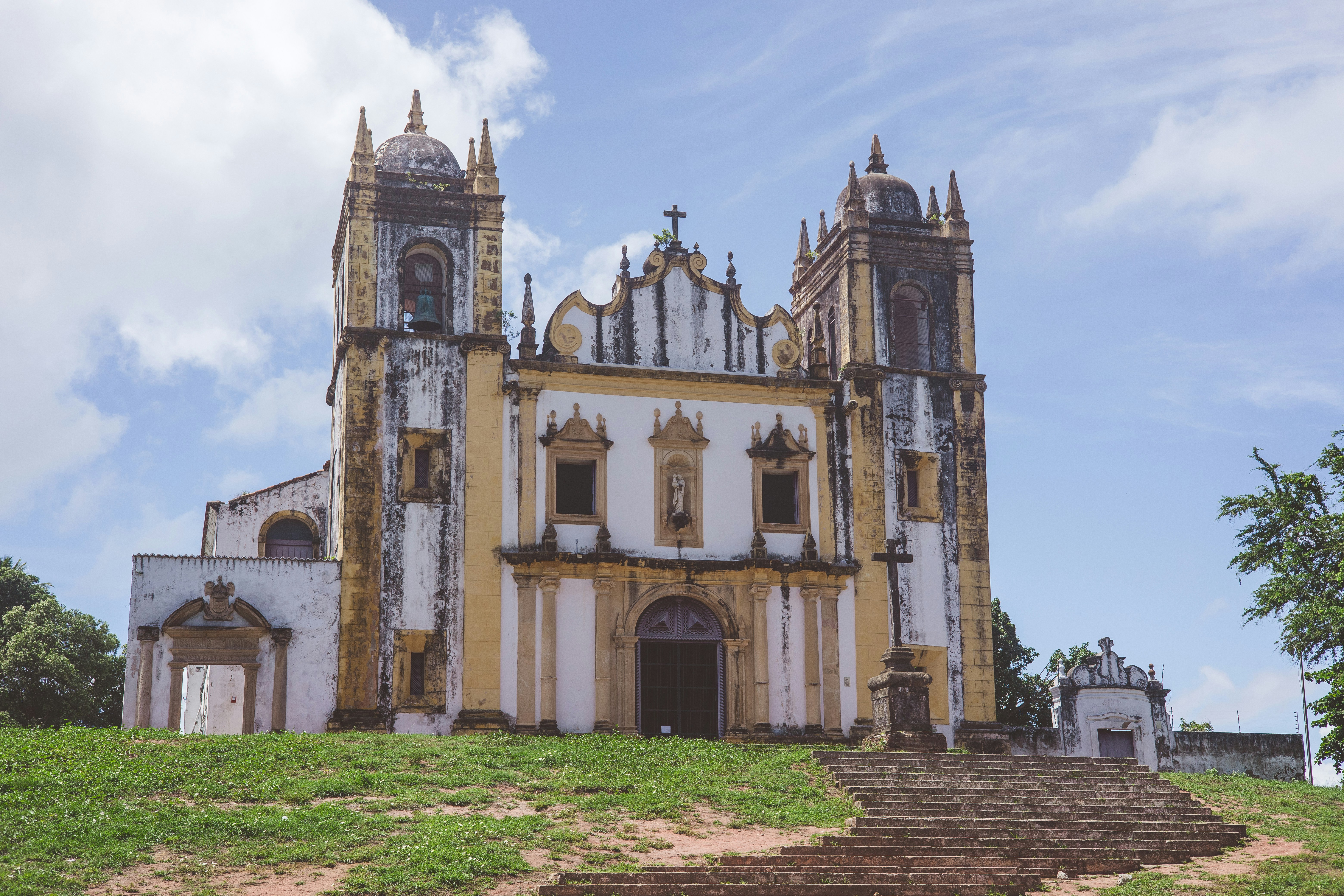 A large church with a steeple and a steeple on top of it