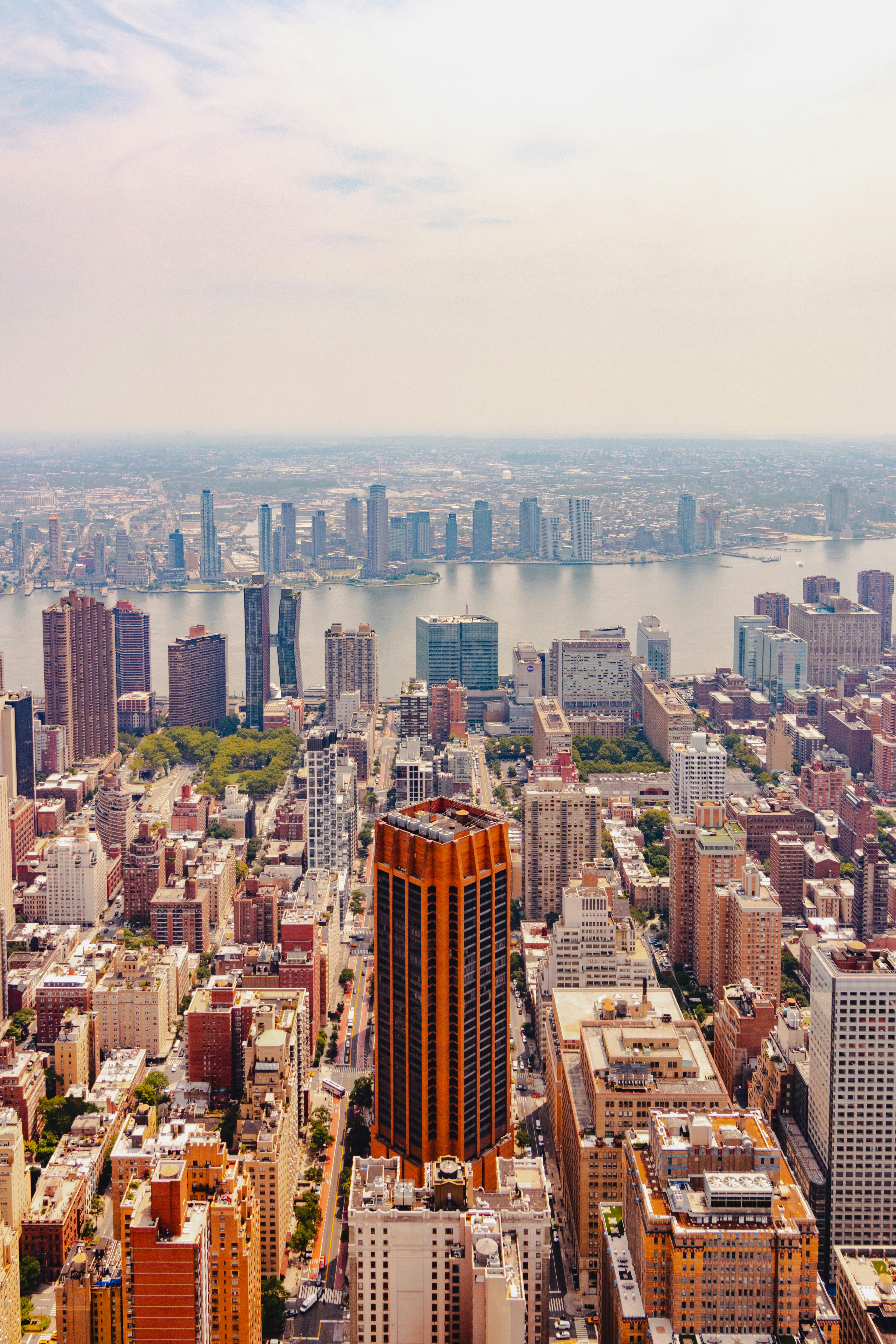 An aerial view of a city with tall buildings photo – Free City Image on ...