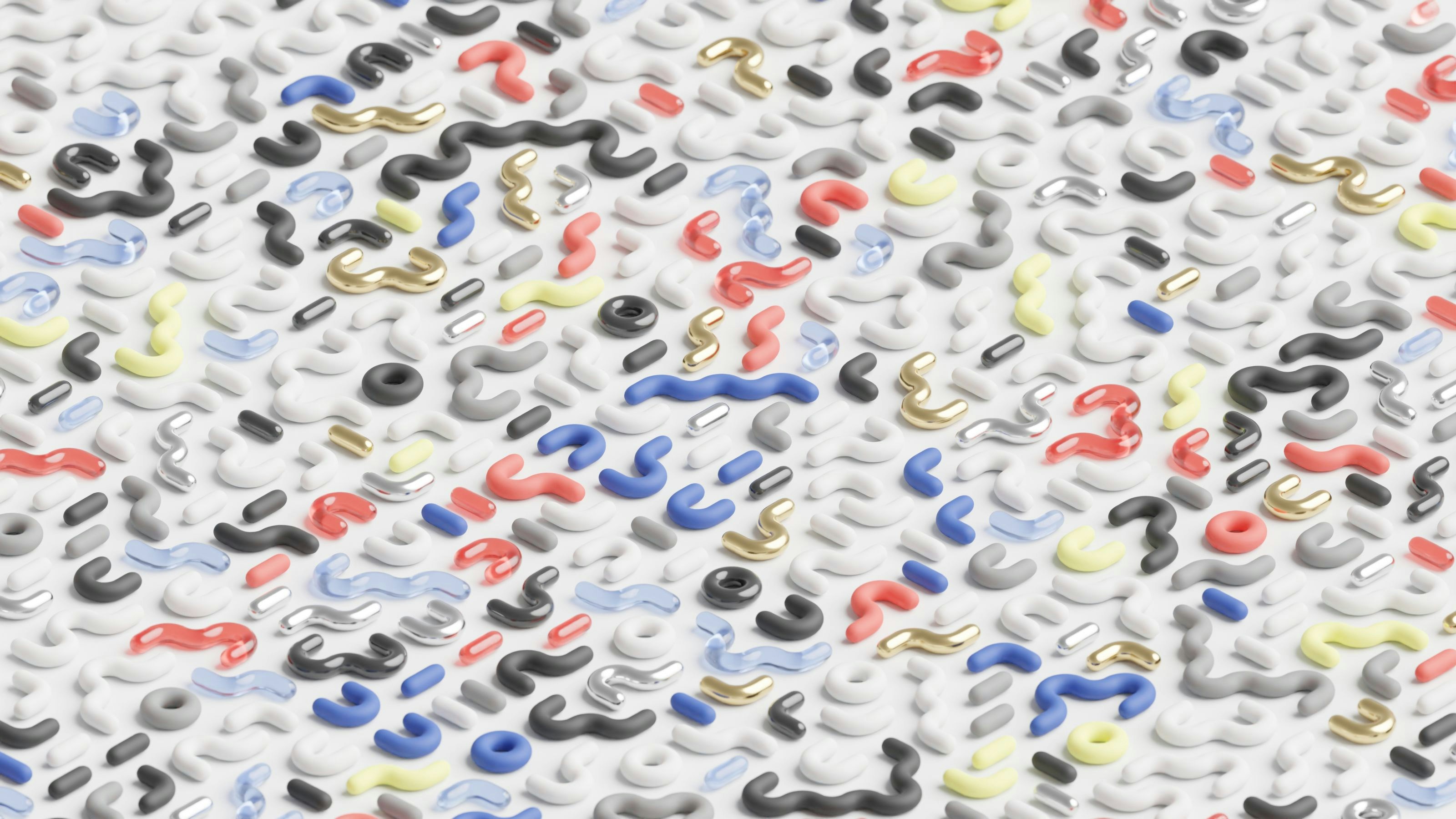 A close up of a white surface with multicolored letters