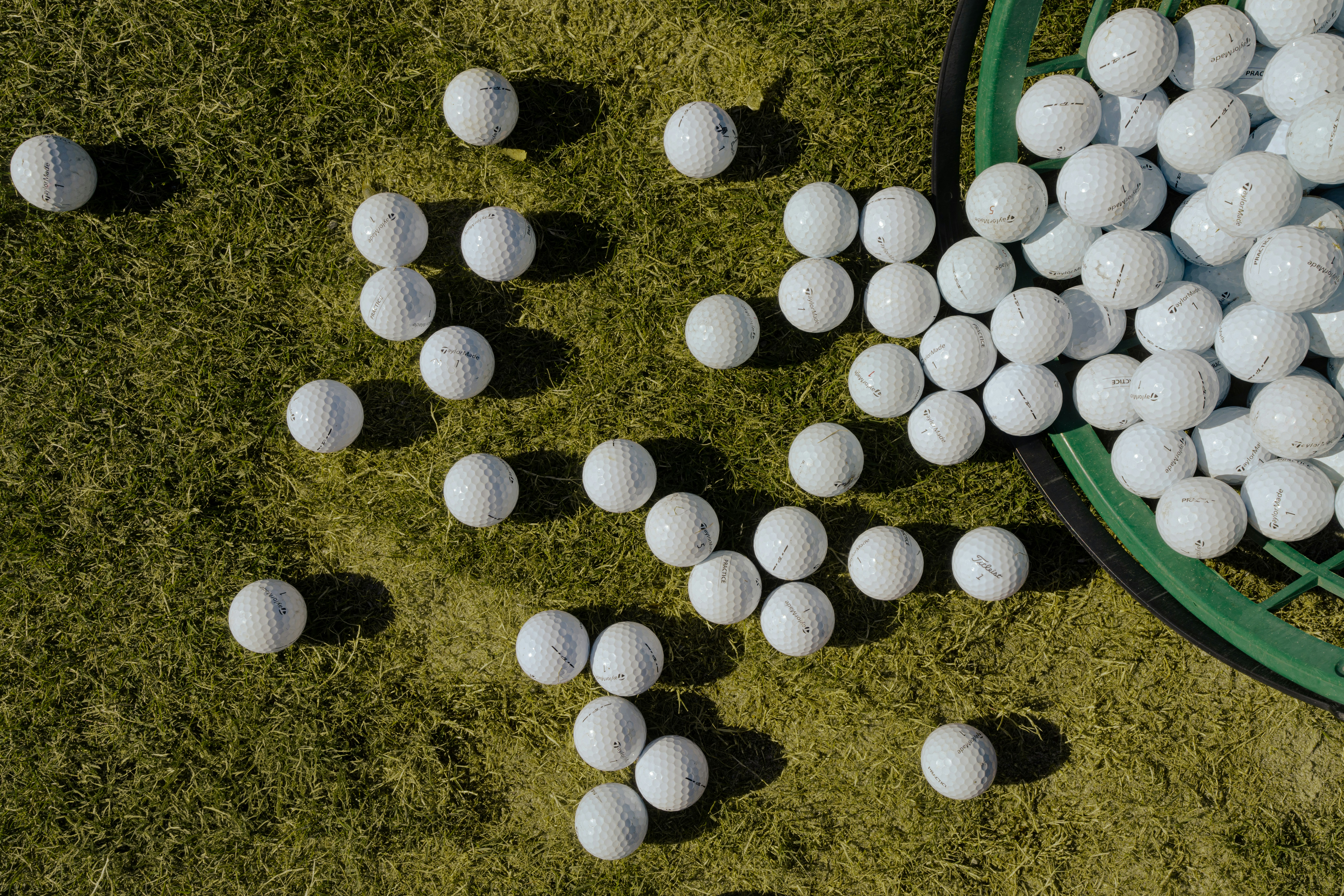 A bunch of white balls sitting on the ground