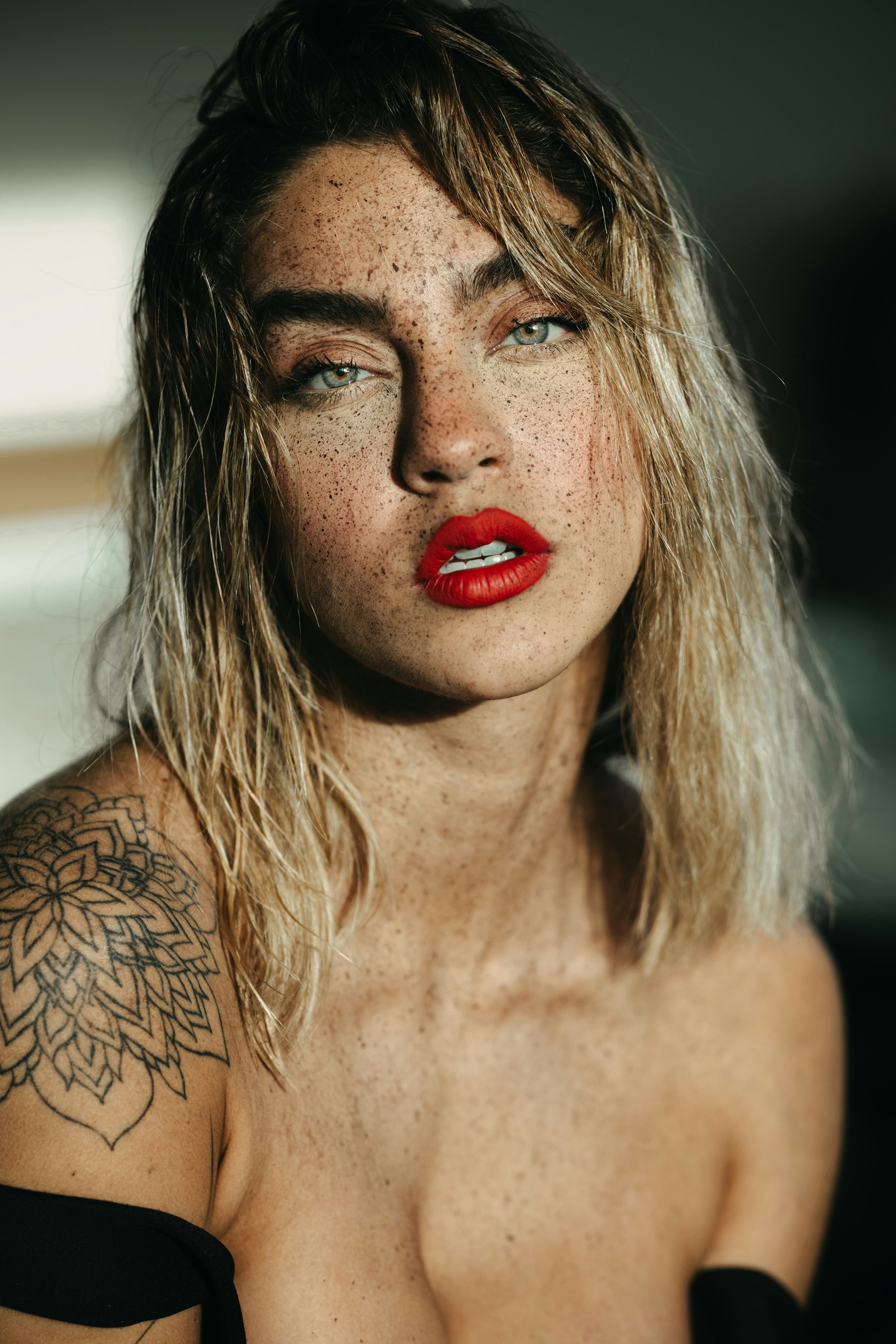 A close up of a person with a red lipstick