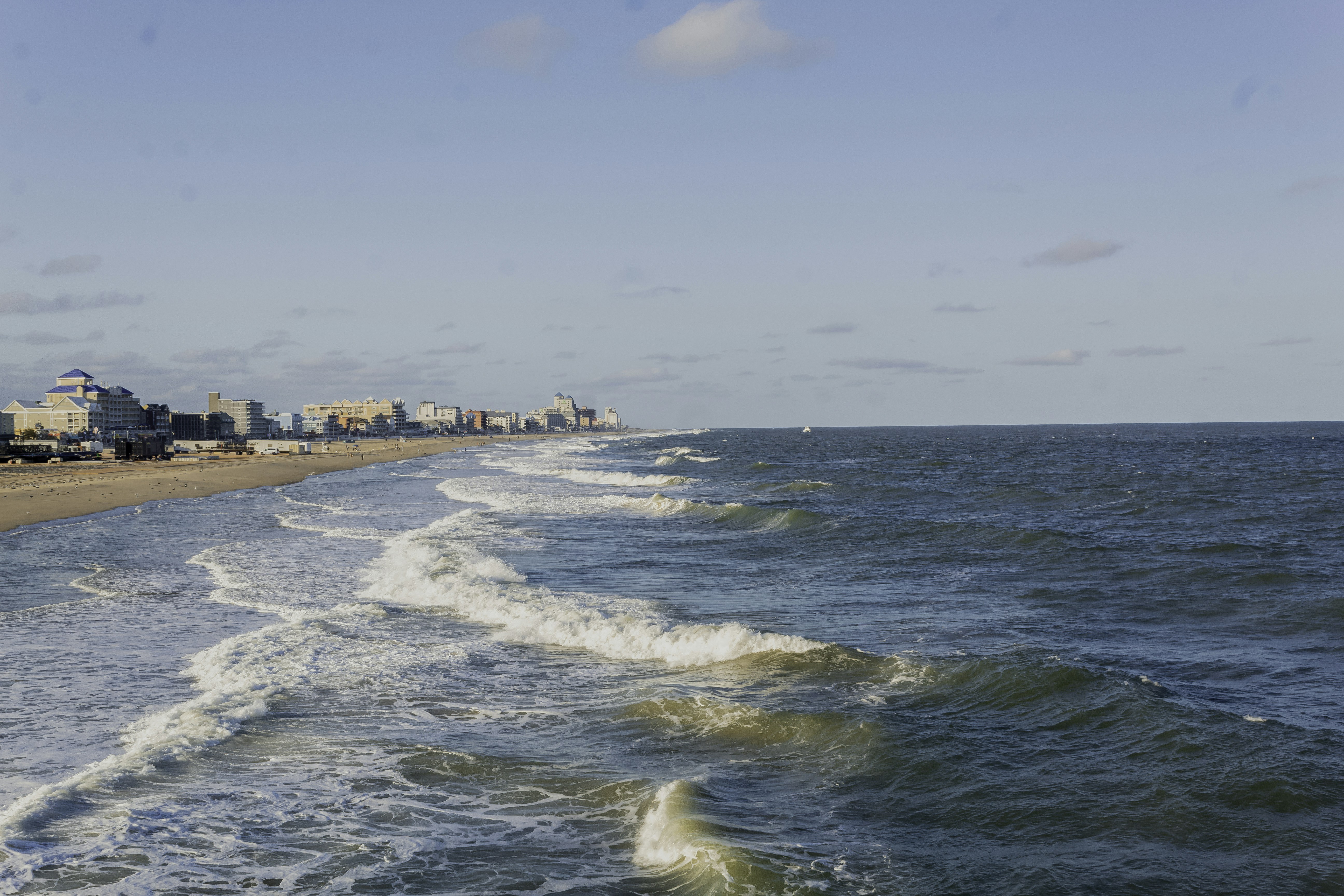 A view of a beach from the shore of the ocean