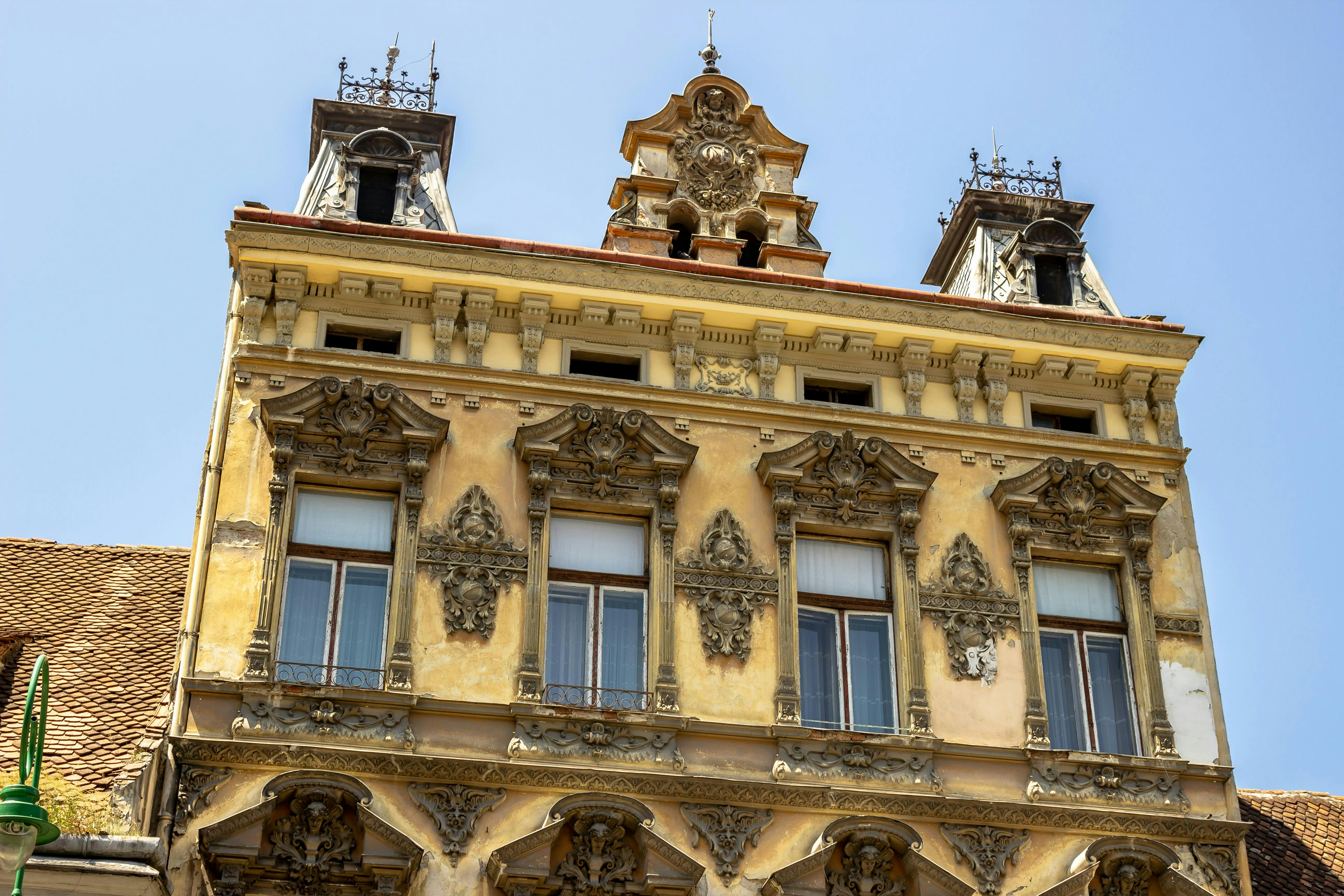 A tall building with a clock on the top of it