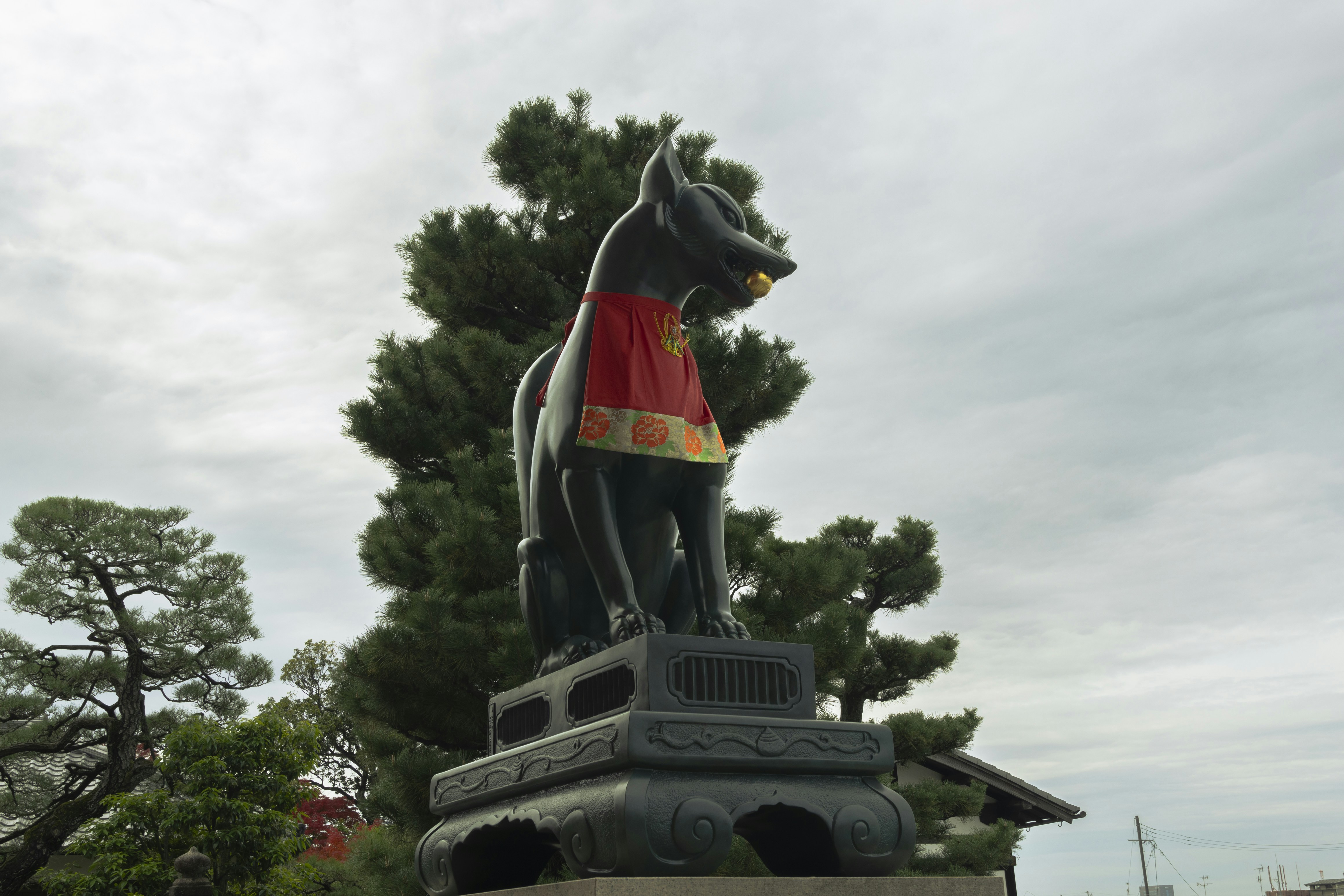 A statue of a man on a horse in a park