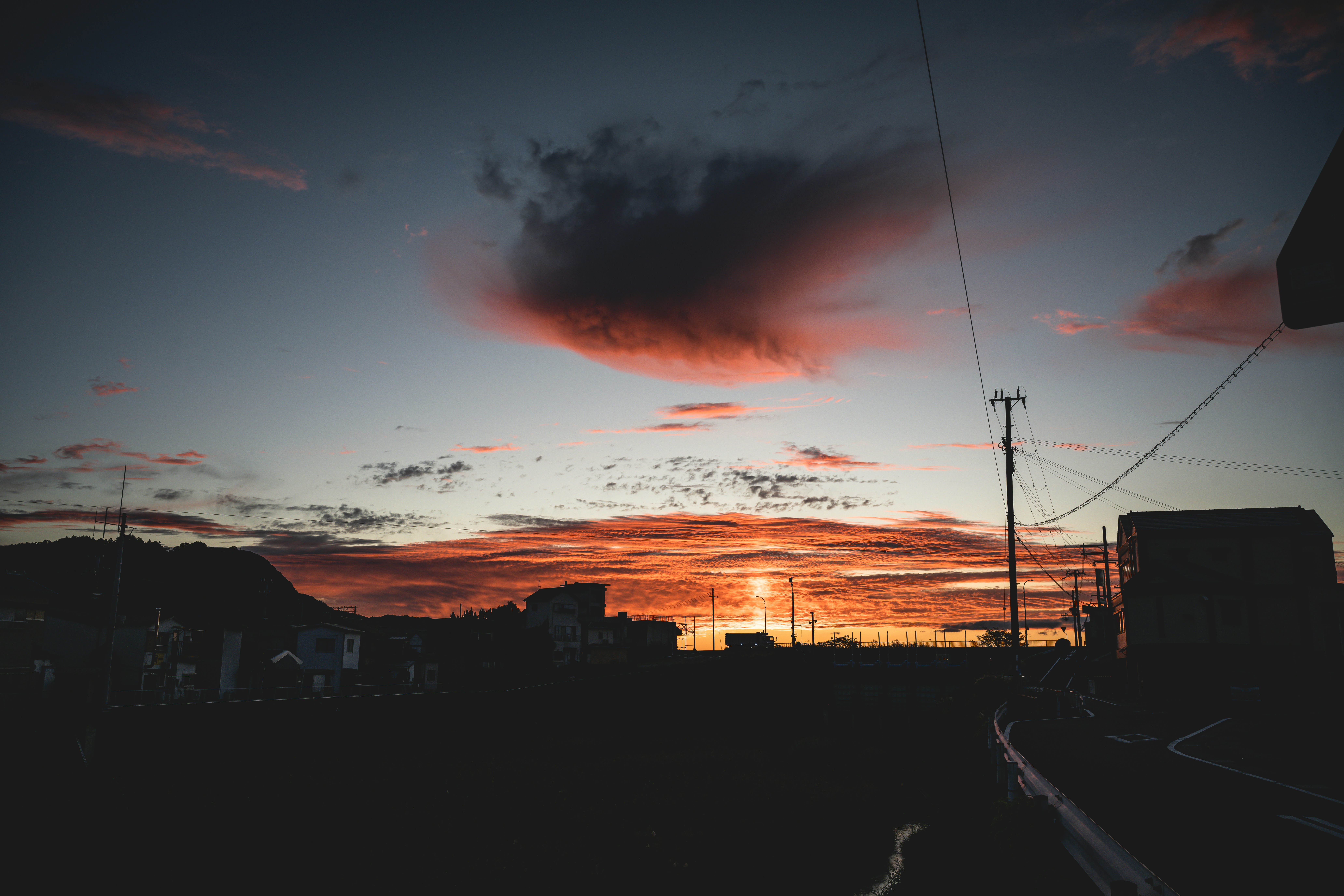 A picture of a sunset taken from a train
