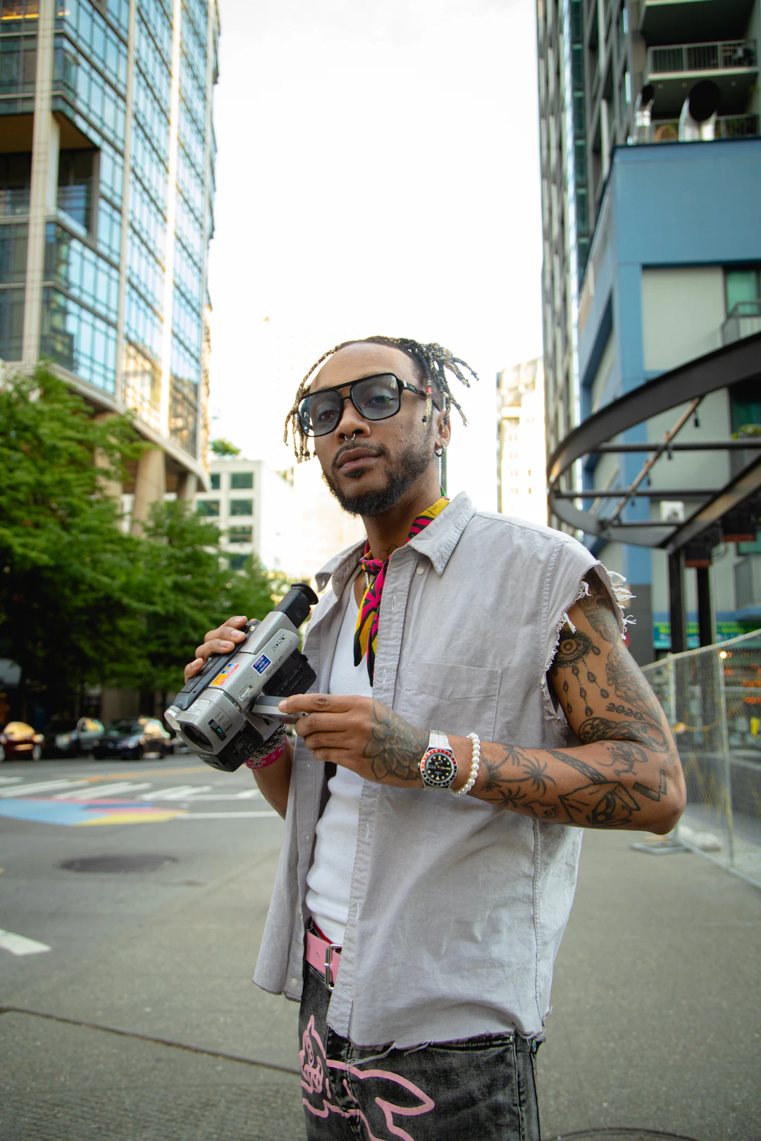 A stylish creator filming on the street — turning followers into owned members