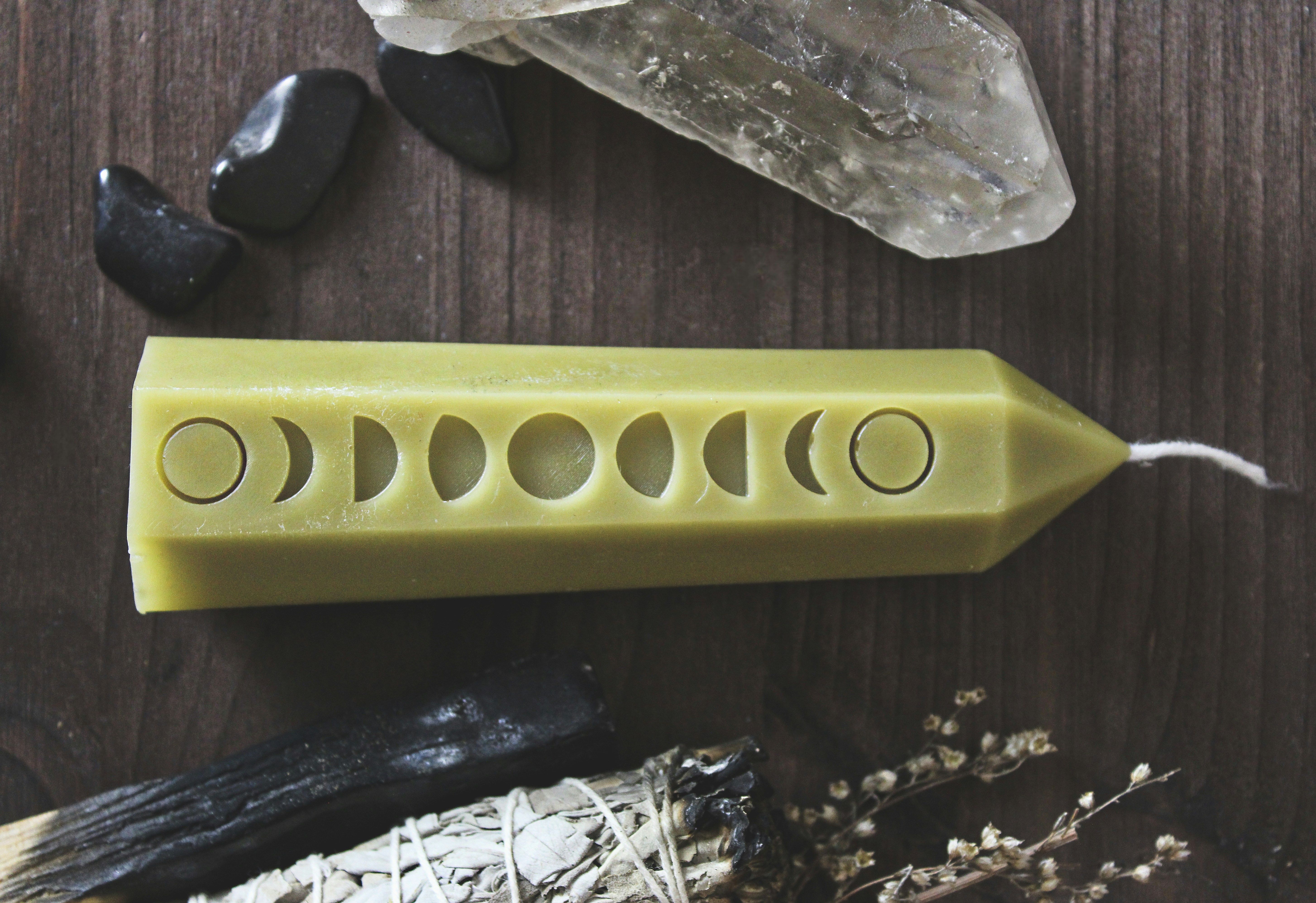 A yellow object sitting on top of a wooden table