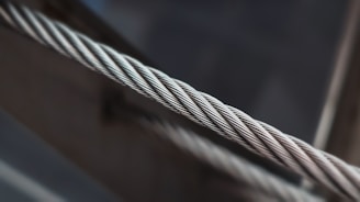 A close up of a rope with a blurry background