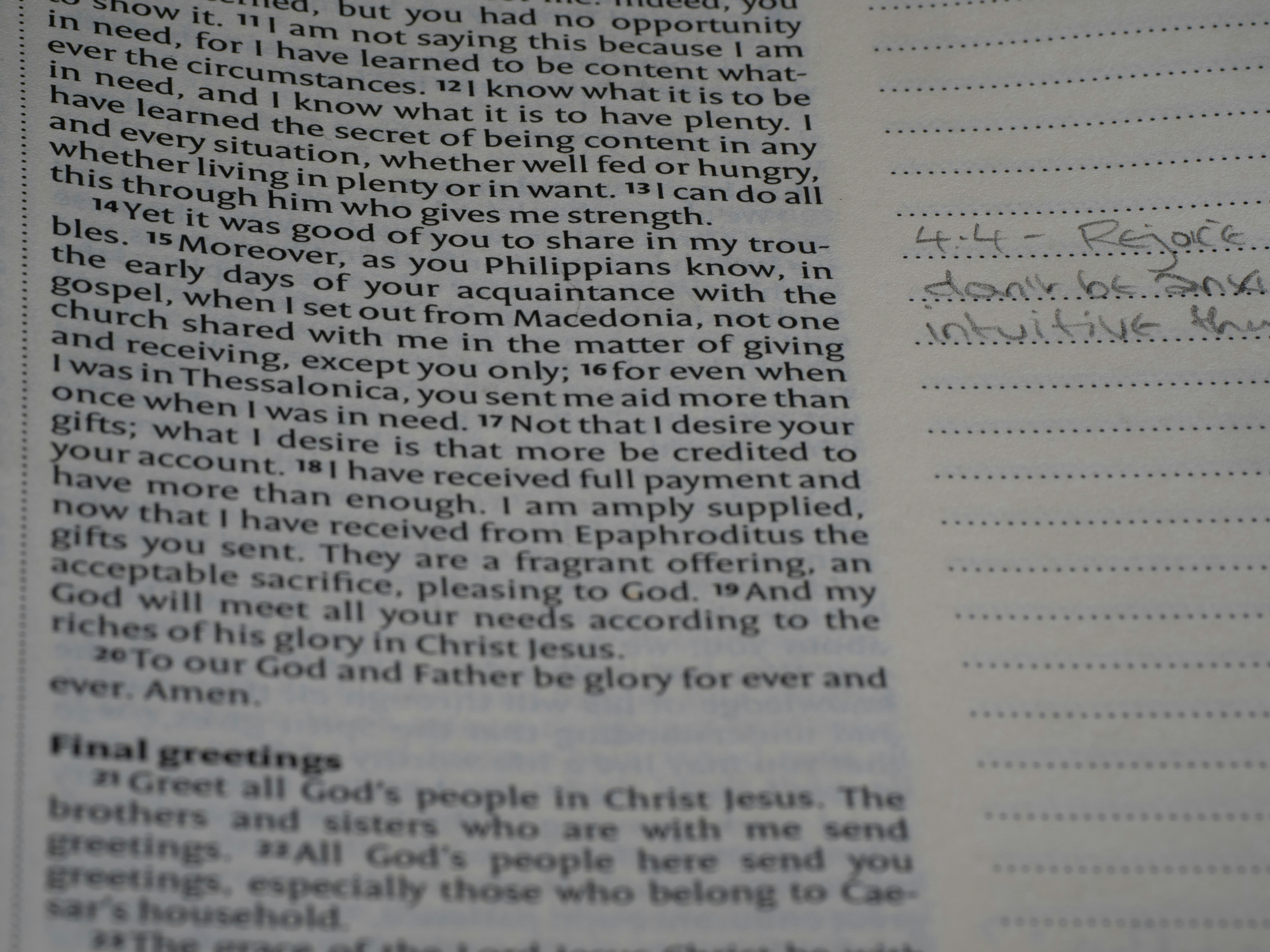 A close up of a book with writing on it