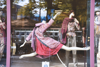 A display of mannequins in a store window