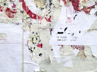 A piece of paper that has been taped to a wall