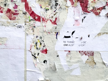 A piece of paper that has been taped to a wall