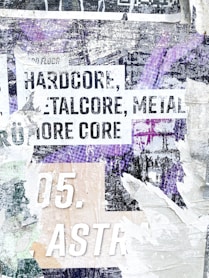 A collage of various signs and words on a wall