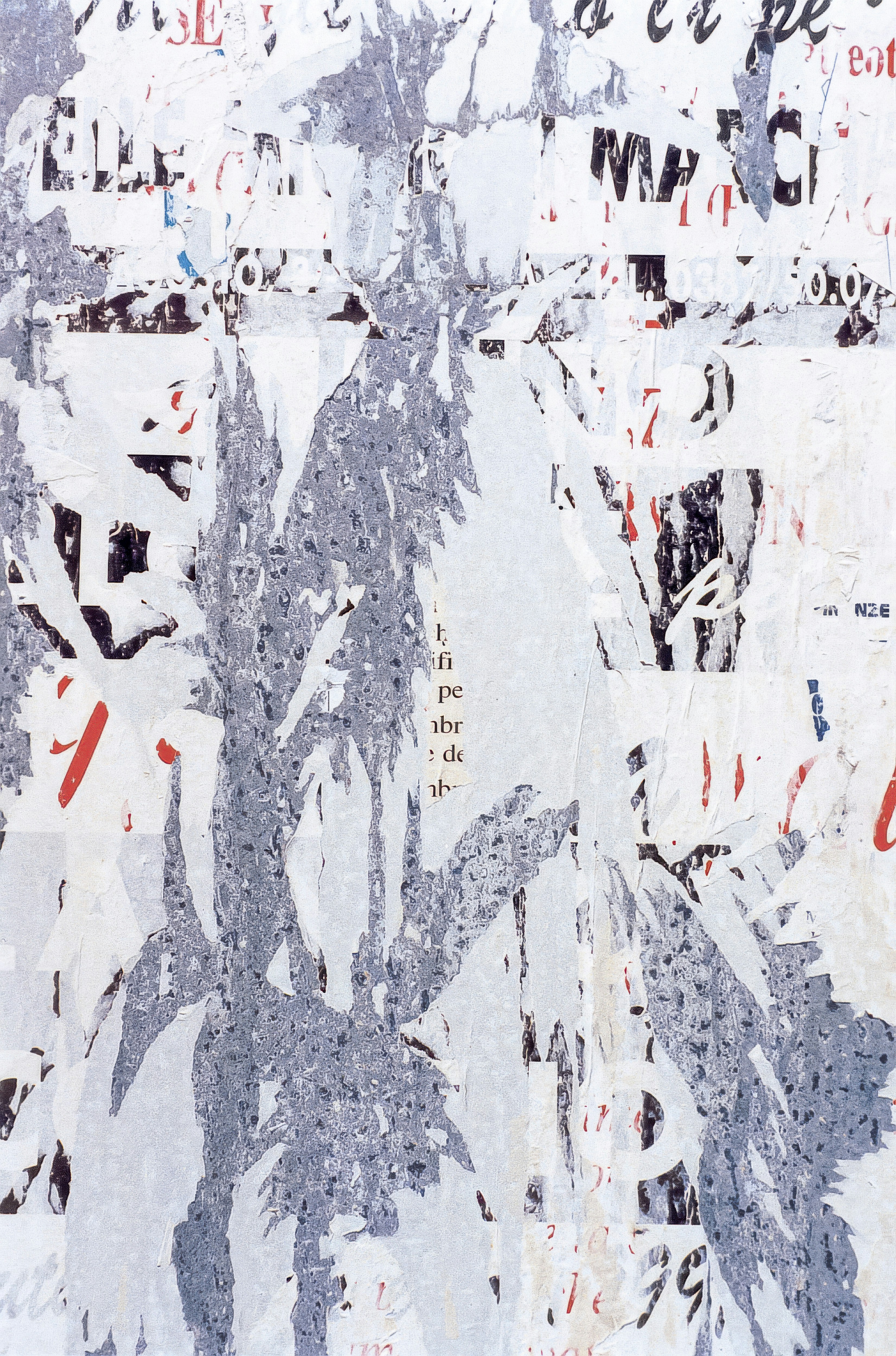 A painting of a tree with red and white letters on it