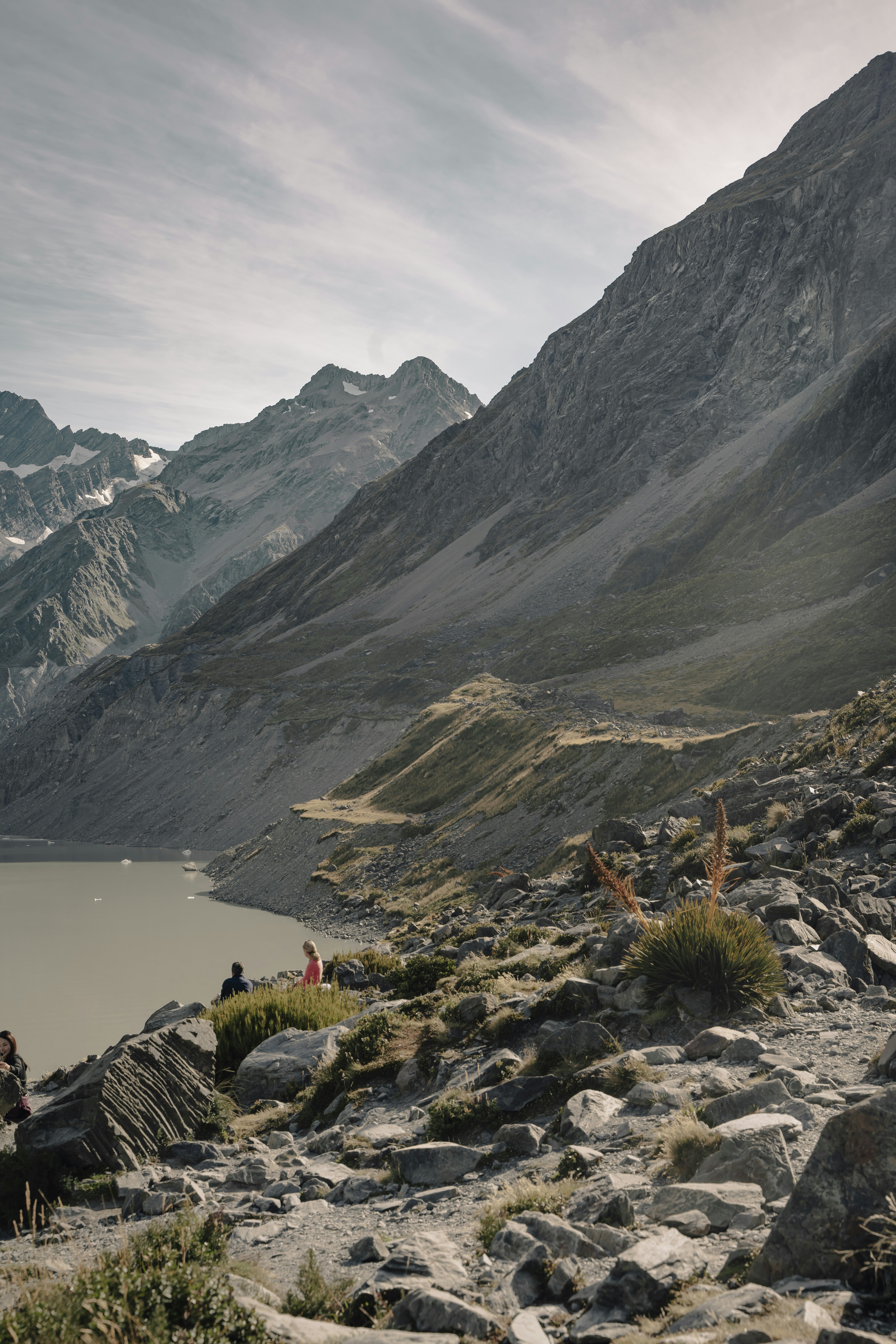 A group of people standing on top of a mountain