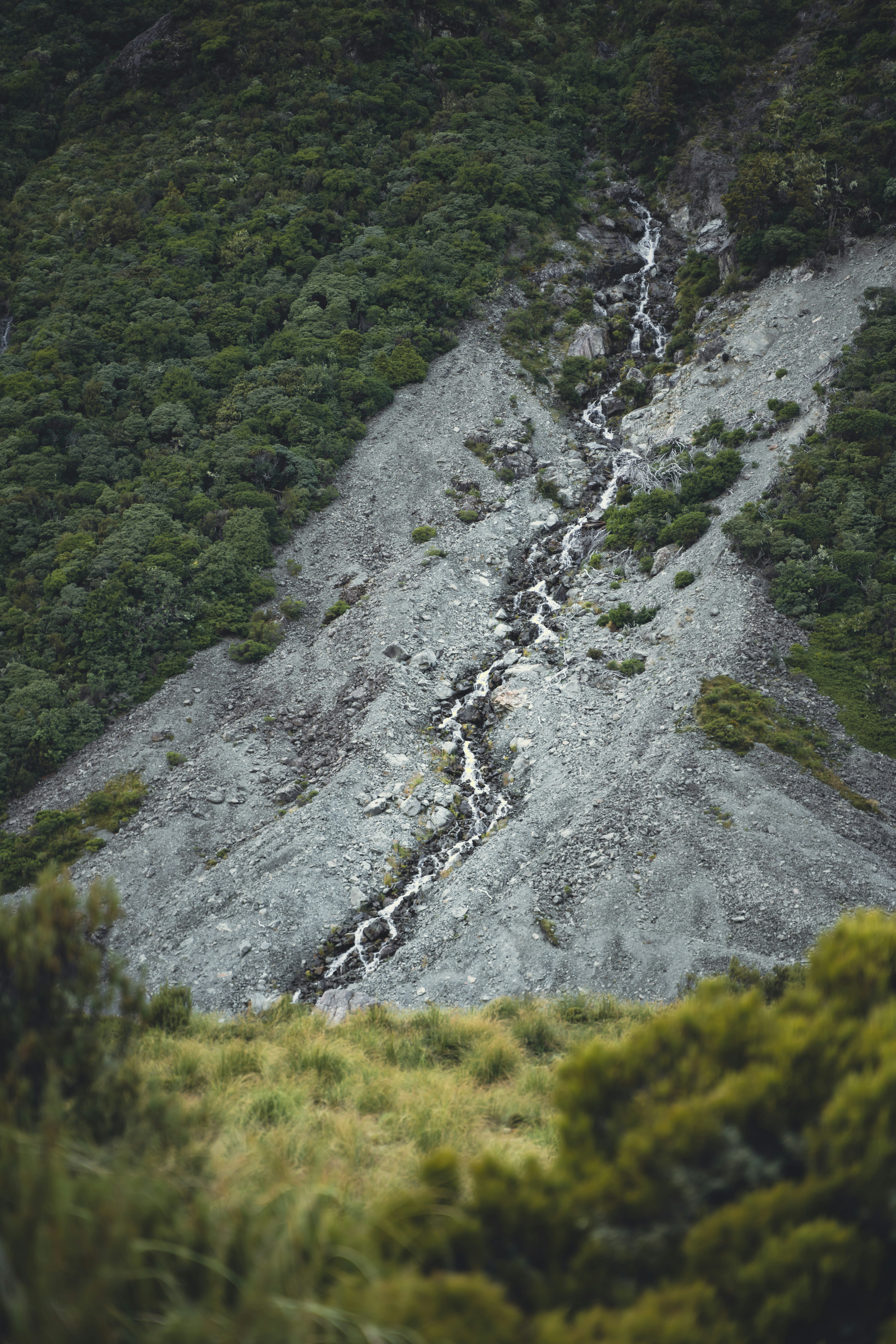 A stream of water running down a mountain side