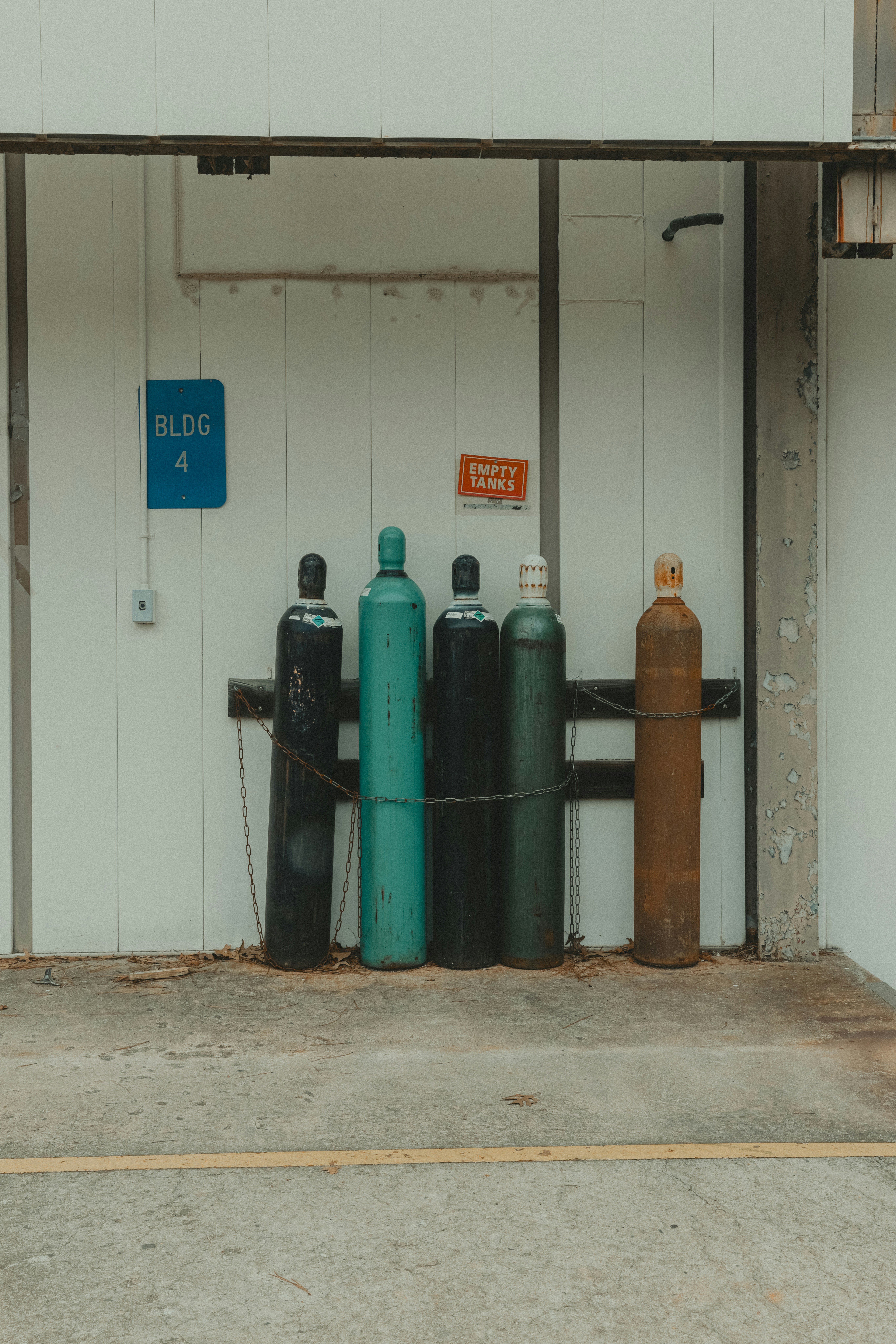 A fire hydrant sitting in front of a building