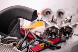A close up of a car engine and parts