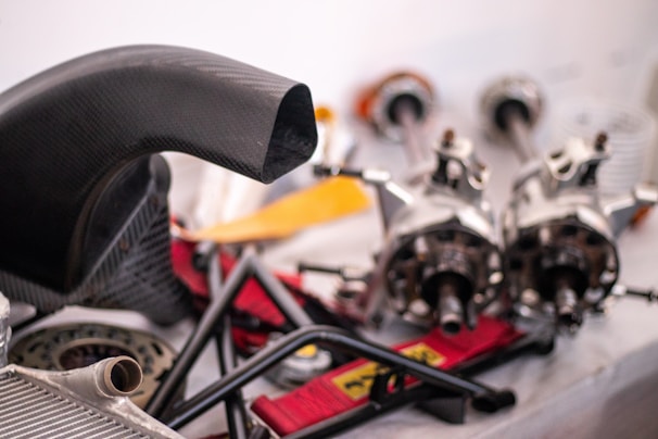 A close up of a car engine and parts