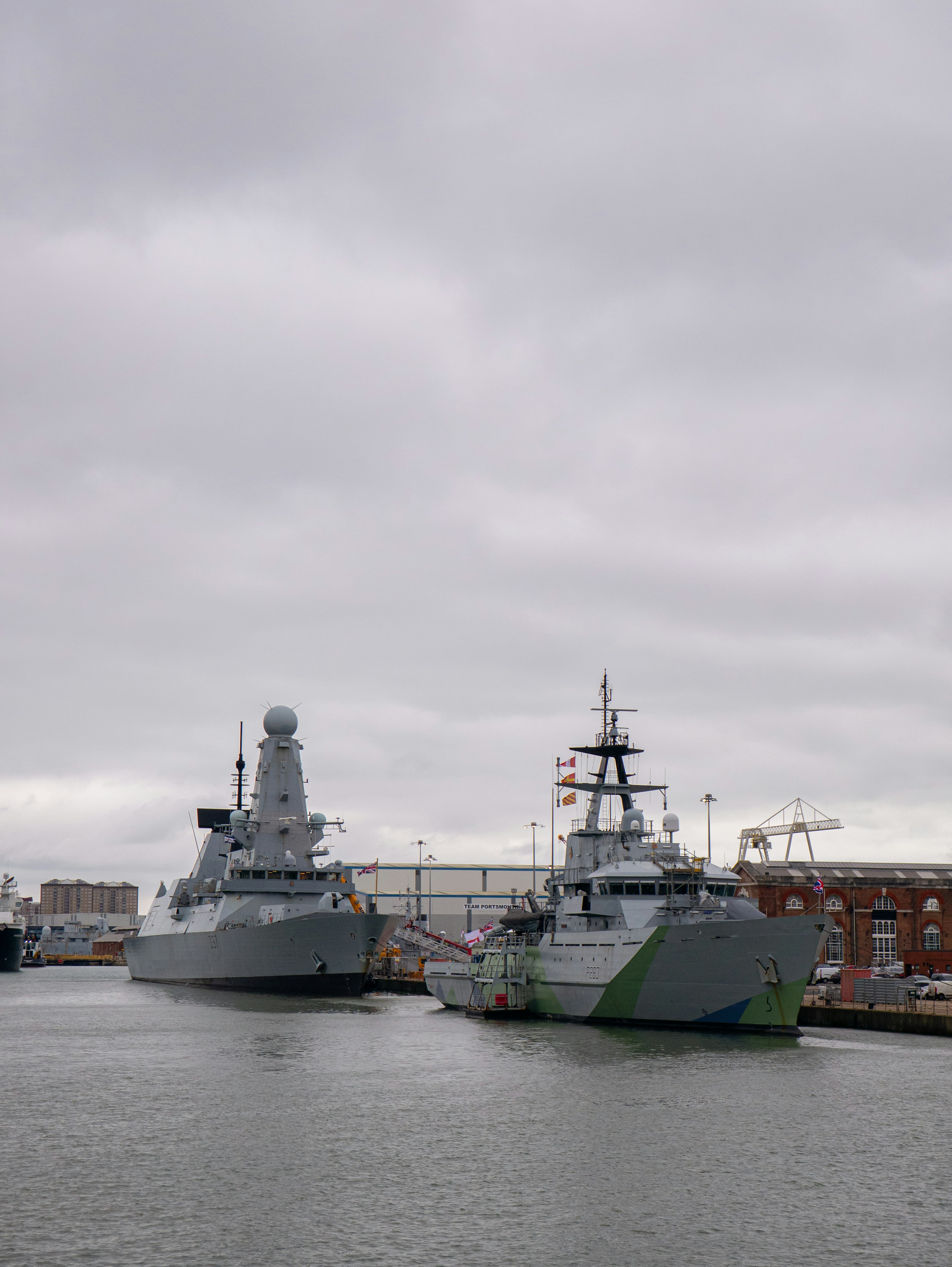 A couple of boats that are sitting in the water